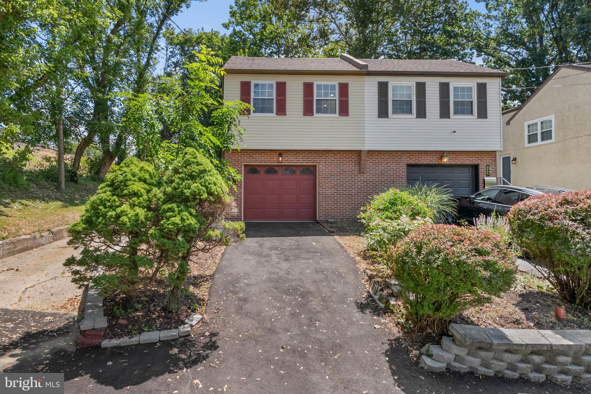 Chestnut Hill Charmer – Stylish, Spacious & Ready for You!
Don’t just dream about Chestnut Hill living—make it yours! This beautifully maintained 3-bedroom, 2-bath split-level twin offers the perfect blend of modern style, everyday comfort, and unbeatable location in one of Philadelphia’s most coveted neighborhoods. From the moment you step inside, you’ll be greeted by sun-soaked spaces and a warm, inviting flow. The modern kitchen is a showstopper with Corian countertops, sleek soft-close cabinetry, and stainless steel appliances—ideal for both culinary creations and casual gatherings. The versatile lower level features a private bedroom and cozy den with direct walkout access to a spacious, fenced yard—perfect for alfresco dining, gardening, or unwinding under the stars. An attached garage and driveway parking add rare convenience. Best of all? You’re just a short stroll to Chestnut Hill’s boutique shops, charming cafés, regional rail, and lush green spaces, giving you a front-row seat to the neighborhood’s lively energy and small-town charm.
Schedule your private tour today and see why this home is the total Chestnut Hill package!