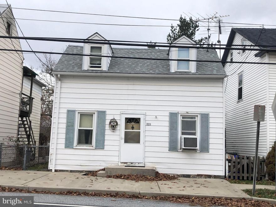 Own a piece of Frederick County history with this detached home built in 1890. Property features a fenced yard, off-street parking, garage and sheds outside. Inside you'll find a 21' x 13' living room, large eat-in kitchen, and three upstairs bedrooms with closets. There is a fourth bedroom with a small closet that could be turned into a bathroom or walk-in closet. Kitchen appliances and washer/dryer convey. Oil tank and furnace serviced 12/4/20; installed 2011. Hot water heater installed 2012. Roof replaced 2019. Vinyl windows throughout. This property is being sold as-is. Investors welcome. Possible rental income property with Mt. St. Mary's close by.
