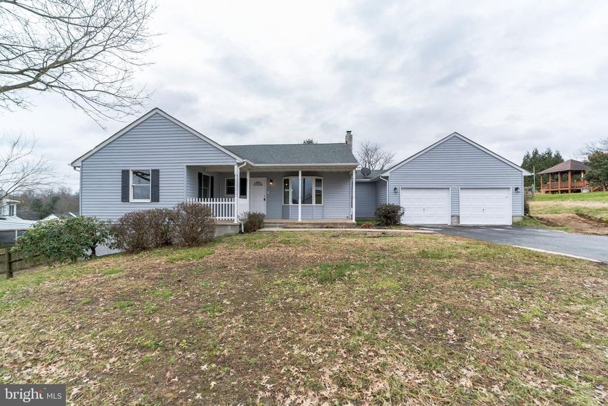 Looking for one floor living then look no further!! This conveniently located ranch home has been recently renovated so all you need to do is unpack your bags. The home is located on a great lot and has plenty of parking in the driveway or the large two car attached garage. The home has a large living room with wood flooring and a vaulted ceiling. The living room leads to the big renovated eat in kitchen with beautiful cabinets, granite countertops with tile back splash and stainless steel appliances. The kitchen has sliders that lead to the rear deck overlooking the very large rear yard. The master bedroom has a renovated master bathroom and a walk in closet. The home also has two more nice size bedrooms and a second full bathroom. The home also has an expansive walk out basement that has a wood stove and could be could be finished for more living space.