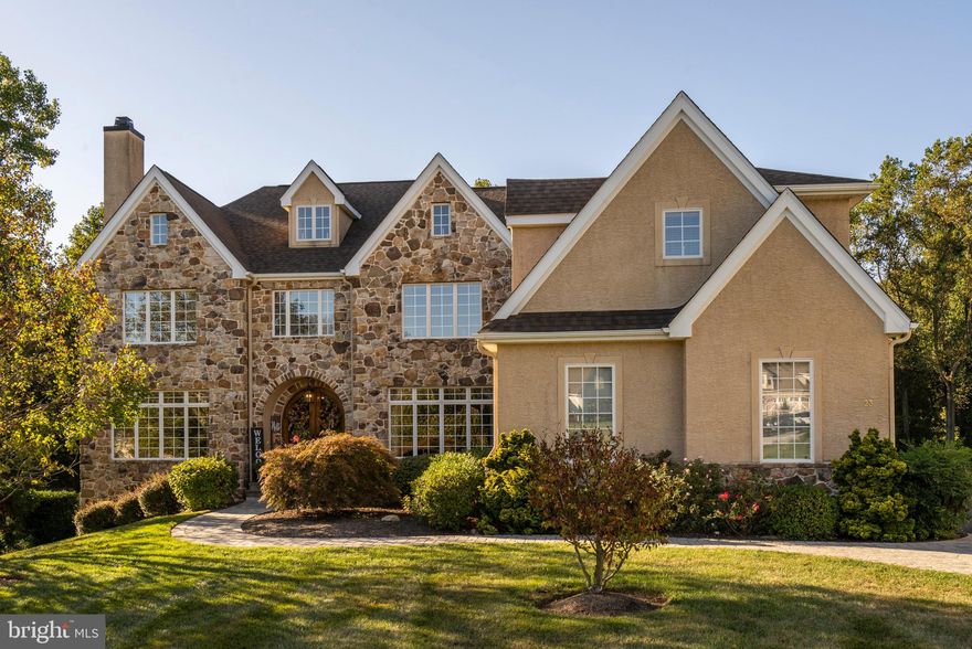 23 Blantyre Circle is a gorgeous 5 bedroom, 5 Full & 2 partial bath home located at the end of the cul de sac off Westtown Rd in the sought after blue ribbon West Chester Area School District (Bayard Rustin High School). This home sits on 2+ acres surrounded with a beautiful outdoor landscape bringing breathtaking views on a daily basis which speaks to the charming character of this home. The  Mendenhall  (Megill Homes) is a center hall design with spacious rooms ready for entertaining. Living spaces are accommodating and welcoming, including: sweeping staircase at the entrance as you enter through the custom double door entrance, formal living and dining rooms, family room, study, sunroom, and a state-of-the-art kitchen with premium chef-grade appliances. Country hardwood flooring, crown molding, 9' ceilings bring together the elegance and warmth of this home.  The features on this house are above and beyond any other you will see; separate zoning and A/C Units for each of the three floors, basement, ground and top floors; custom built 500 bottle cedar wine cellar with its own unit controlling temperature and humidity; the pool is heated through a natural gas heater; Full Custom Bar; expansive rear deck that transitions to a screened in breezeway, and so much more you have to experience it for yourself!