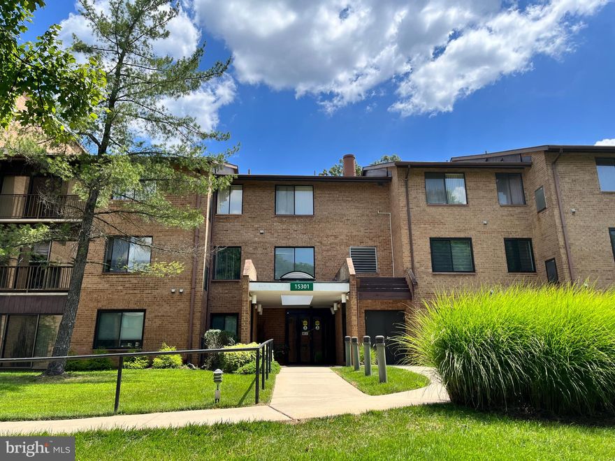 Enjoy this cozy condo on popular Pine Orchard. Walk-out level to yard and path, this unit offers updated flooring, kitchen counters and appliances, neutral paint and new hot water heater, faucets, and door hardware. Filled with natural light, you'll enjoy a reserved parking spot, easy building access and additional storage space in building. With laminate floors through main living areas, spacious and open living and dining rooms are close to kitchen and sliders to enclosed patio. Main bedroom is large with a walk-in closet that has built-in shelving for easy organization, and the private bath has step-in shower and newer commode. Second bedroom off hallway makes hosting guests easy. Enjoy morning coffee in the bright kitchen with popular counter and floors. Large utility closet perfect for storage and separate pantry closet means you'll have room for extra. All utilities are included in the condo fee, so this unit makes for easy budgeting. Enjoy all of the Leisure World amenities that make this a popular Active Adult destination.