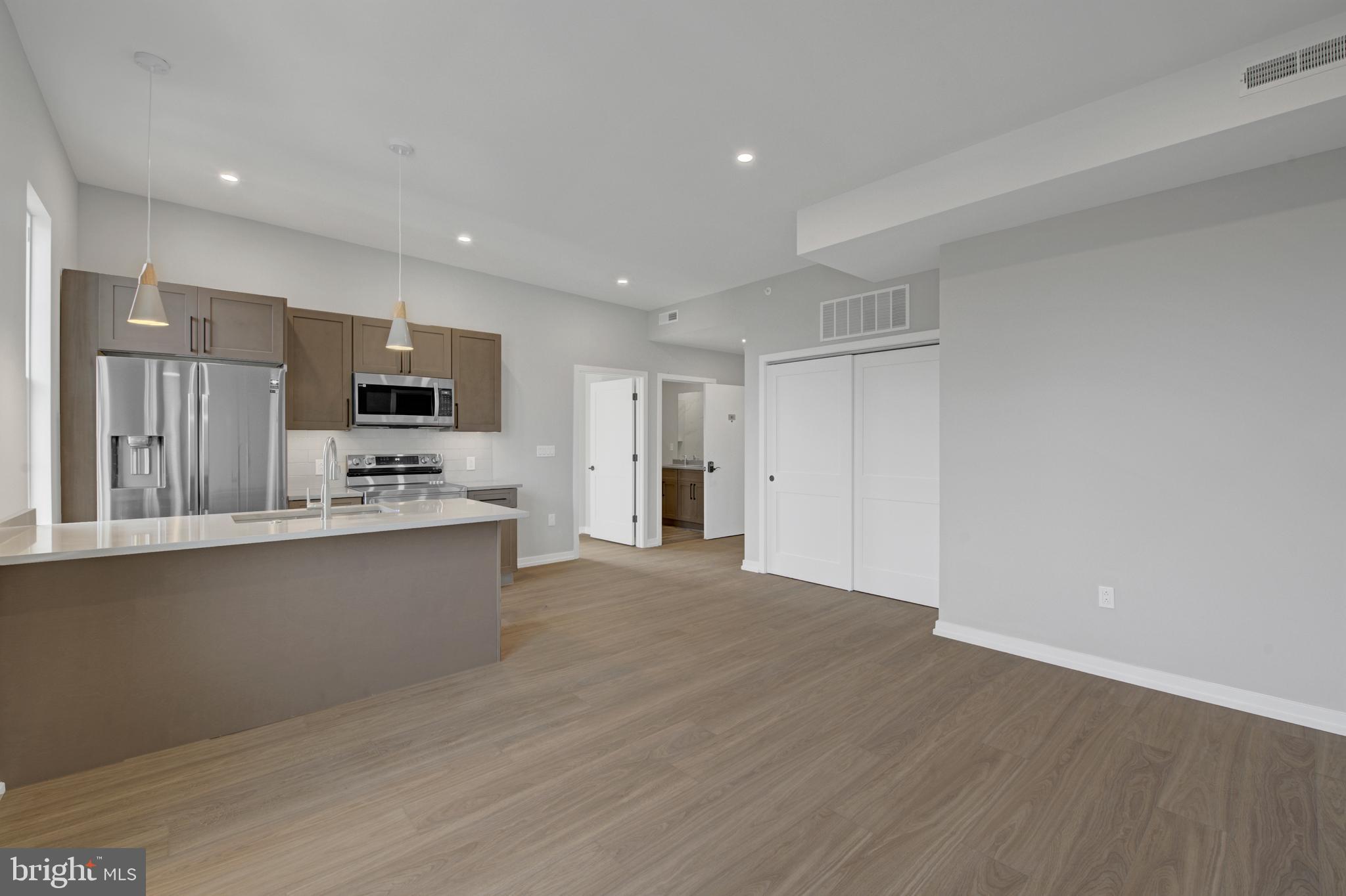 Welcome to Innovator Village, nestled in the heart of Graduate Hospital! This gated community is home to 82 luxury units featuring top of the line finishes. 2445 Innovator Way offers everything you could desire in a city apartment and can be moved into immediately. This unit features a spacious, open living room with huge windows and lovely natural light, a kitchen with quartz countertops and stainless steel appliances, a beautiful bathroom, hardwood floors and an in unit washer/dryer. The building features a shared roof deck with beautiful views of Center City. Innovator Village is located on the bustling Washington Ave corridor with easy access to Drexel University, CHOP, Penn University, I76, restaurants, shops, public transportation and much more! On site parking is available for lease for $300/month when available (short waitlist currently).