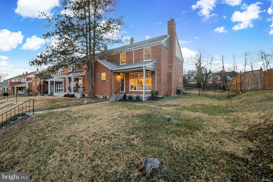 Stunning 4 Bed, 2.5 Bath End Unit with Private Parking & Income Potential!
Rare larger end unit on beautiful tree lined block in Chinquapin Park/Belvedere neighborhood! This 4 bedroom, 2.5 bath home has premium upgrades throughout. Elegant foyer entry with hardwood floors flowing through main level. Gourmet kitchen features granite countertops, brand new stainless steel appliances, designer lighting, and ample cabinet space. 3 spacious bedrooms upstairs with generous closets. Large primary bedroom is a true retreat. 
Fully finished basement with entertainment space, 4th bedroom and rear office area.  Separate rear entrance offers incredible flexibility. Use as rental apartment for monthly income, entertainment area, home gym, in-law suite, or home office. Endless possibilities! All 2.5 bathrooms  in this home showcase ceramic designer tile and modern fixtures.

Game changer: extra lot in back provides private parking for 4 cars or trucks, extremely rare in Baltimore City! Street parking also available. Expansive fenced garden with mature plants perfect for entertaining, gardening or pets.

Prime location near I-83, York Road, and Northern Parkway. Minutes to GBMC, MedStar Union Memorial, and Johns Hopkins hospitals. Easy commute downtown or anywhere via major highways. Grocery stores, restaurants, shopping, and excellent MTA bus lines all nearby. Close to schools. Move-in ready! Don't miss this rare opportunity!