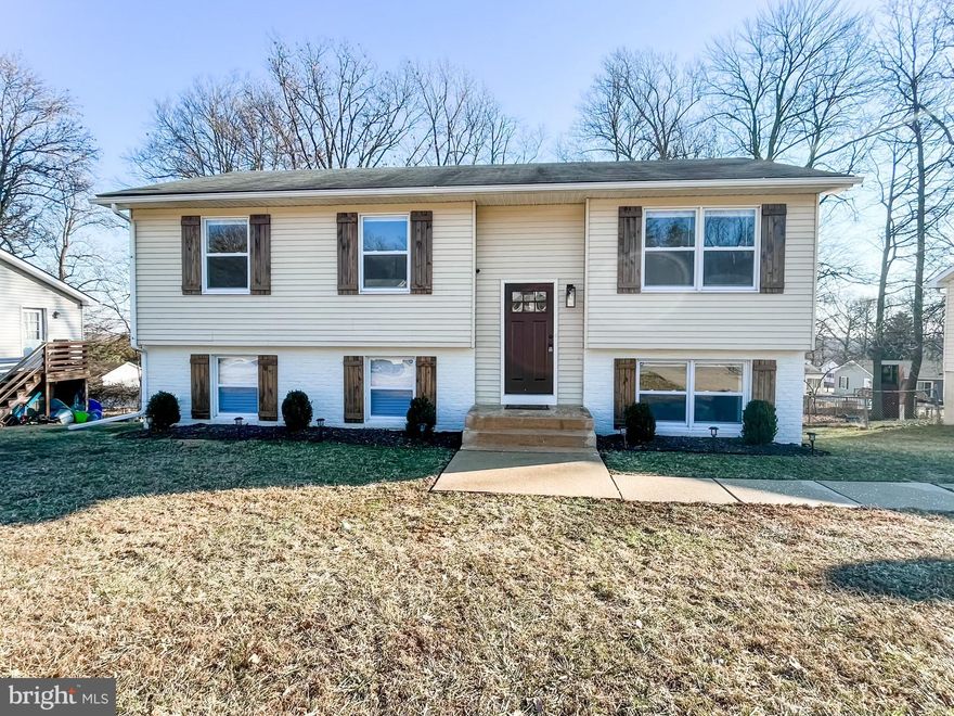 ***Back on the market due to buyer changing their minds!! *****  Inspections complete and repairs in process.  

Welcome to 323 E Village Rd in Elkton, Maryland,just a few minutes off of Pulaski Highway and I95. This beautiful, completely renovated split level home is move-in ready with many beautiful touches. Enter the front door and choose to go upstairs to the main living area and bedrooms, or downstairs to the basement level which includes the laundry room, a large storage area that could be easily finished, and a bedroom and powder room. Head back upstairs to the main living space that includes a living room and dining room with lots of windows to let in natural light. The dining room sliding door opens to a huge deck that overlooks a beautiful backyard. Check out the upgraded kitchen complete with stainless steel appliances, luxury flooring, and backsplash, all new in the last two years . Go up the next set of stairs to the three bedrooms and full bathroom. New windows, new bathrooms, new flooring, new appliances all in the last two years.  This home needs NOTHING except new owners and is move-in ready.  Seller needs to close in May.  Showings start Friday, January 28 and will be "go and show" through the weekend.