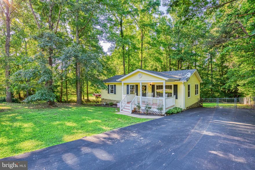 THIS HOME IS A CHARMER! THE VINYL FRONT PORCH INVITES VISITORS INTO A BEAUTIFUL RANCHER WITH A CHEERFUL FEELING  INSIDE & OUT! THE FRONT ROOM MAKES AN EXCELLENT SPACE FOR OPEN CONCEPT DECORATING,  THE DINING SPACE IS PERFECT FOR FORMAL OR EVERYDAY MEALS, THE KITCHEN HAS AN ISLAND AND AMPLE CABINET SPACE, DOWN THE HALLWAY YOU WILL FIND THE LAUNDRY CLOSET, PRIMARY BEDROOM AND BATH WITH A SHOWER STALL,  BEDROOM #2 AND BEDROOM #3 AND A SPACIOUS HALL BATH. LAMINATE FLOORING THROUGHOUT,  VAULTED CEILINGS, UPDATED VINYL DOUBLE HUNG WINDOWS,  BRIGHT NATURAL LIGHTING, ADDITIONALLY, THE EXTERIOR FEATURES A STAND-UP CRAWL SPACE - LOCATION OF THE 2 YEAR INSULATED WATER HEATER, GUTTER GUARDS, LARGE BACKYARD FULLY FENCED AND A PAVED DRIVEWAY. OWNER HAS TAKEN GREAT CARE OF THIS HOME. THE CURB APPEAL IS ACCENTUATED BY THE ROSES THAT ARE STILL BLOOMING. THIS PROPERTY IS SURE TO CHARM YOU!