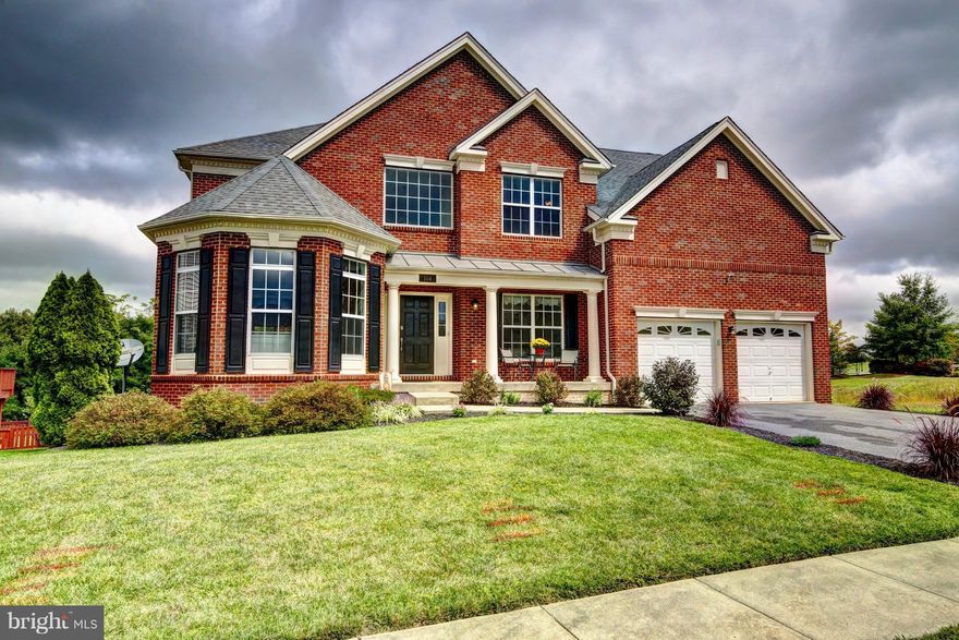 Stunning 5BR 5Bath brick front Colonial w tons of upgrades! LL offers a full bed/bath, office,LR, DR, sunroom, gourmet kitchen w/SS & FR w/FP. HW on lower level.Upper level has Master Suite w/full bath & sitting room. Fully finished basement w/media room & kitchenette. Deck off rear home. Rear yard backs community area extending yard to tree lines. Community Pool & tennis courts. Close to I-81!