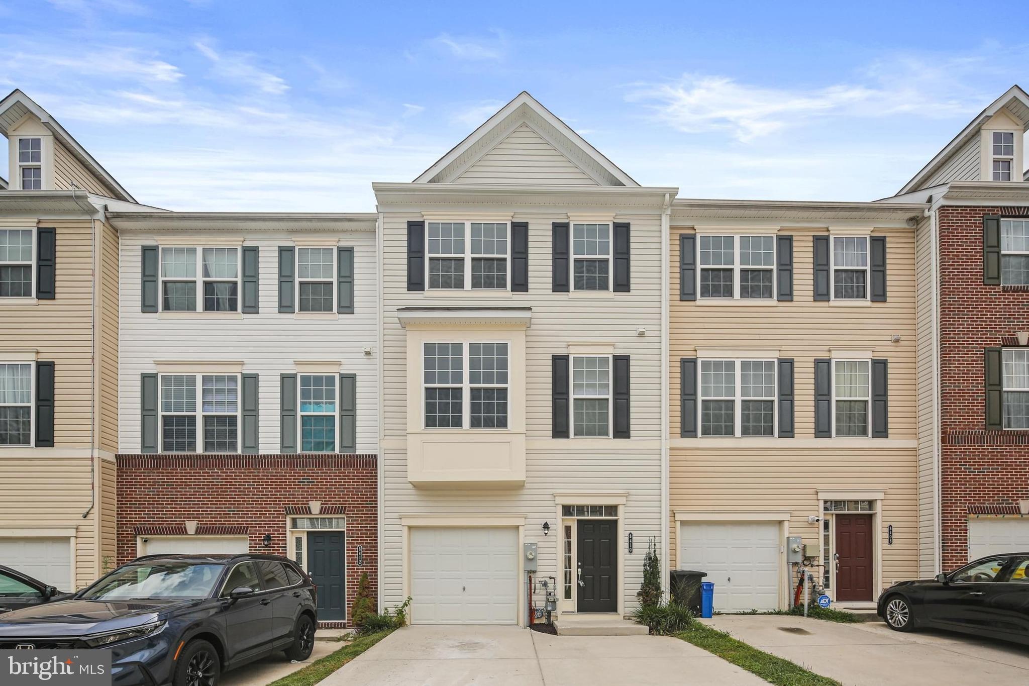 Beautifully laid out townhome in Jacobs Forest Community! BRAND NEW carpet and freshly painted! This home offers a RARE 4 bedrooms, 3.5 bathrooms and 1 car garage with parking pad for 2 cars! Bump Out On All 3 Levels Gives Extra Flexible Space! As you enter the home, the foyer opens up to stairs to the main level or a door to the fourth bedroom, full bathroom and recreation room. Make your way upstairs to an open floorplan concept with the living room, kitchen, breakfast nook, sunroom and half bathroom. The kitchen features ceramic tile floors, granite countertops, center island, breakfast bar, stainless steel appliances (NEW GAS RANGE!) and espresso cabinets and pantry. The breakfast room sits between the kitchen and sunroom. The sunroom has a sliding glass door to the composite deck. The living room is spacious and boasts gleaming hardwood floors. A half bathroom finishes off this level. The third level features the primary bedroom with en suite bathroom, 2 sizable bedrooms, and a full bathroom in the hallway. The washer and dryer is also located on this level for added convenience. Great location for commuting - close to Route 32, 295, 100, I-95 & Military Base! Close proximity to shopping, entertainment and dining! Community offers jog/walk path & playgrounds.