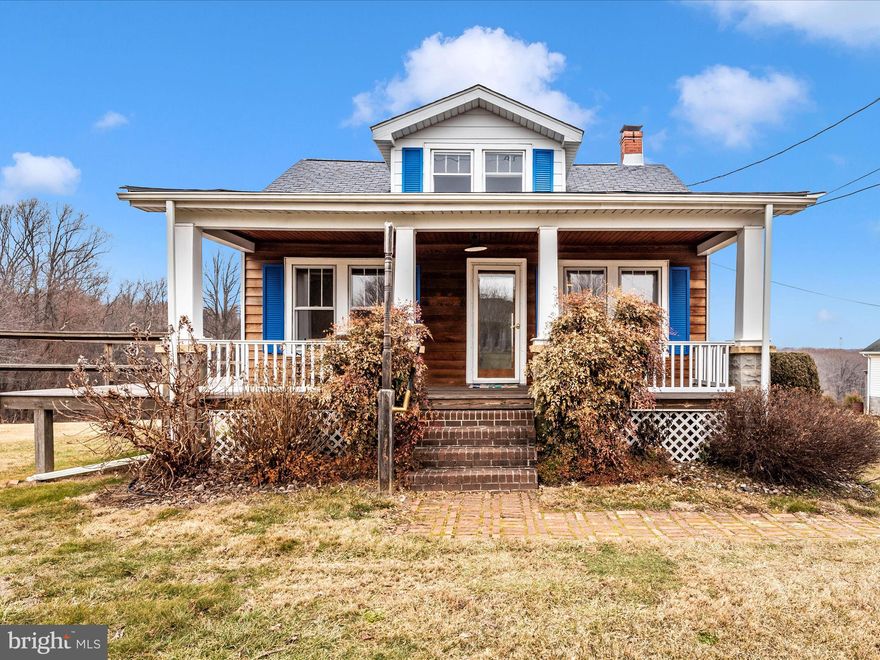 This charming cape-cod with two amazing acres is ready for your upgrades! Featuring two main floor bedrooms and a third on the upper level. The primary bedroom has an oversized window to enjoy the beautiful view. The living room is open to the kitchen with dining area and has lovely hardwood floors. This level also has a full bath with tub. The lower level has a fireplace in the family room, a recreation room, laundry area and walkout to the backyard. The exterior of the property offers a front porch that wraps around the side to the back deck with a patio underneath so that you can enjoy the large open property and the picturesque view. Also includes a two level, oversized detached two car garage with workshop and shed and additional parking in the driveway. The workshop has a sandblasting booth. This property offers an amazing panoramic view of pasture and woods. Property is being sold as is.