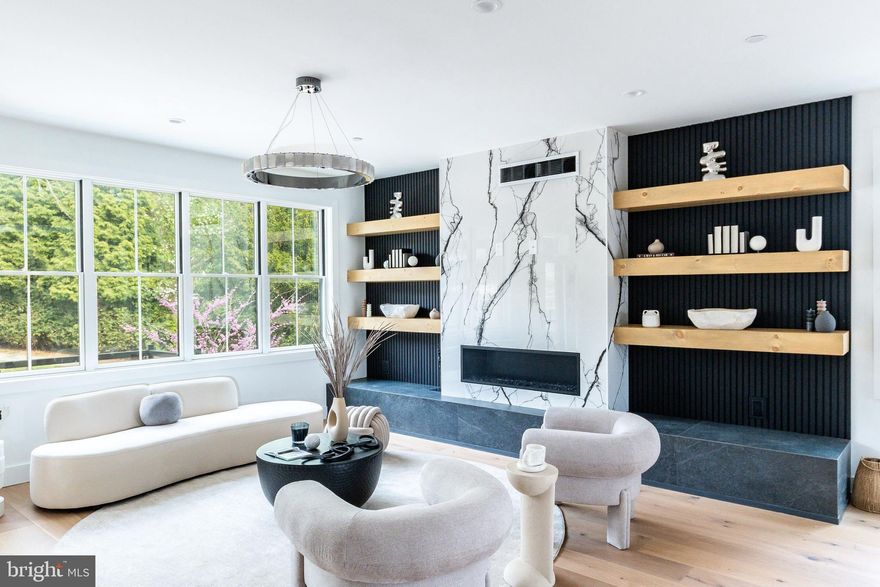 {OPEN HOUSE Sunday 1/17 @ 12-1 PM  }
NOW FOR A LIMITED TIME  - Inquire about  Financing Incentives 2-1% Interest Rate Buydown for qualified Buyers 
Fully Upgraded Designer Home, 10y tax abatement. 

Welcome to 112 Righter Street, the crown jewel of the Righter Haus Collective—an exclusive enclave of two standalone luxury brick residences set in the heart of Philadelphia’s Wissahickon neighborhood. Crafted in collaboration with sustainable builder E-Built and acclaimed interior designer Monica Miraglilo, this fully upgraded home is a masterclass in elegance, comfort, and purposeful living.
Spanning over 4170  sq ft on a coveted corner lot, the residence offers 4 spacious bedrooms, 3 full baths, 2 powder rooms, and multiple levels of indoor-outdoor living designed to inspire calm, creativity, and connection.
At 112 Righter, outdoor spaces are not just amenities—they’re a lifestyle.
Ascend to the rooftop terrace, where a glass-enclosed lounge space offers panoramic views of the Center City skyline, the Schuylkill River, and the surrounding treetops of historic Wissahickon Park. Perfect for sunset gatherings or serene solo mornings, this private rooftop oasis is equipped with a wet bar, wine fridge, and sink, seamlessly blending luxury and leisure under the open sky.
Just off the main living area, the kitchen-level terrace provides an elegant setting for al fresco dining or evening wine with friends. Framed by modern railings and lined with clean architectural detailing, this space connects directly to the chef’s kitchen—making indoor-to-outdoor entertaining effortless.
Downstairs, the private IPE-clad patio extends from the lower-level flex space through dramatic Nano-style glass doors, offering a secluded, ground-level retreat. Ideal for quiet moments or garden-style gatherings, it’s bordered by a steel-framed privacy screen and thoughtfully designed to provide both openness and shelter.
-Interior Excellence|-
Inside, the home exudes warm minimalism and meticulous detail. Natural light pours through Pella windows, illuminating European oak wide-plank flooring and soaring ceilings.
The chef’s kitchen is a true focal point—featuring an Arabescato marble countertop and full-height backsplash, custom white oak cabinetry, and a handcrafted live-edge white oak island with gold hardware. The Wolf/Sub-Zero appliance package, custom metal-and-glass wine cellar, and spacious living room with a slate-and-quartz gas fireplace complete the main level’s inviting flow.
-|Private Quarters Designed for Retreat|-
The second floor includes a cozy sitting room/den, two well-appointed bedrooms with a shared hall bath, and a third en-suite bedroom with a walk-in closet—perfect for guests or growing households.
The primary suite occupies the entire top floor, offering a tranquil escape with a boutique-style dressing room & walk in closet , custom built-in window bench, and a spa-inspired bath adorned in  Calacutta marble and Blanco Thassos mosaic tile. Dual Marble vanity, a freestanding soaking tub and oversized step-in shower invite relaxation and renewal.
__2-car garage off a private driveway 
__Optional  EV charger
__5-stop elevator from lower level to rooftop
__Two high-efficiency HVAC systems + tankless water heater
__10-year property tax abatement
__1-2-10 -year builder warranty
Set in the peaceful, tree-lined enclave of Wissahickon—just minutes from Wissahickon train station , lush trails, Penn Charter, Golf Course  and the vibrant restaurants and shops of Manayunk’s Main Street—112 Righter offers the perfect balance of natural serenity and urban access.
[This is more than a home] It’s an architectural sanctuary—designed for those who value craftsmanship, intentional luxury, and a life beautifully lived.
| 4 Beds • 3 Full + 2 Half Baths • 3 living Areas ( Living room, Informal Living,  Den ) 4,174 Sq Ft,  2 Car Garage , inquire today !