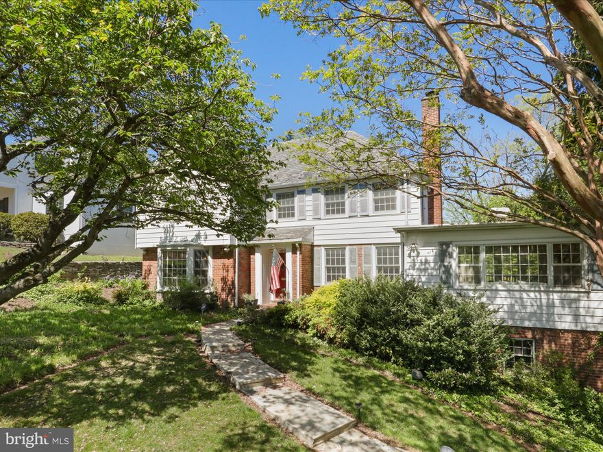 An extraordinary offering in a neighborhood where opportunities like this are few and far between. Homes on Rock Spring Rd across from Washington Golf and Country Club's golf course,  rarely come on the market ---  and now is your chance.  NEW PRICE!   NEW OPPORTUNITY FOR YOU! SELLER READY TO NEGOTIATE!
This 1940 classic three-level Colonial  is packed with potential.  Step into the main level through the  foyer that sets the tone for the rest of the house.  This level consists of a formal living room, formal dining room, an updated kitchen with a casual dining area, a spacious family room, an expansive sun porch adjacent to a multi-tiered deck complete with hot tub overlooking a private rear yard, surrounded by mature landscaping... Now for the  views! Serene, picturesque views of the lush, manicured fairways and rolling greens create a private, peaceful and naturally elegant setting that is just  steps from your front door.
The upper level offers a large primary suite with a walk- in closet and full bath along with 3 additional bedrooms and a full hall bath.  Fixed stairs to the attic...add another level if you wish.
The lower level offers flexible space plus a 5th bedroom/office with a remodeled full bath just steps away.  The laundry, a storage room with ample wine storage, complete the basement which opens to the 2 car side-load garage.
The traditional layout, solid construction and move-in condition allows you comfortable living now, with endless opportunities to renovate, expand or rebuild --- the choice is yours! This is a smart investment in one of the area's most sought-after neighborhoods.