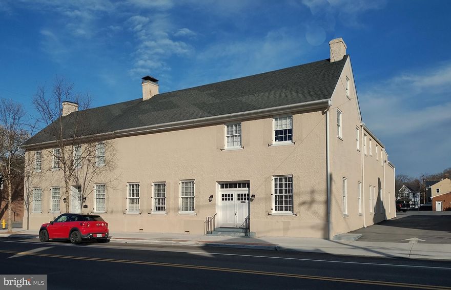 Price Reduction!
•   Unique office complex located in downtown Winchester with a comfortable work environment.
•   Includes exercise area with shower, racquetball court and basketball half-court for stress free zone. 
•   One block off of the Old Town Walking Mall and a short walk to downtown Judicial center, local government center. 
•   Two-story office building with 17,865 SF on a corner. 
•   Large parking area with covered garage space that could be leased to private car collectors, etc. 
•   Great opportunity to expand your company's presence in the Winchester market. 
•   SVN also has 50 South Cameron St listed for sale. Both properties could be combined as a Portfolio Sale.
Additional 1,407sf Income Producing Building could be added if Purchaser Desires