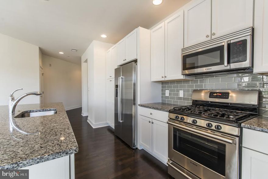 Gated Indoor Parking in Graduate Hospital! Light filled CORNER unit in sought after 2400 South w/ floor to ceiling windows in living area w/ sliding glass doors... Greenfield School Catchment... Your Bosch stainless steel kitchen features light cabinets with upgraded granite counter , tile back splash and overhead recessed lighting throughout living room and kitchen... Oak hardwood floors in living room..Fresh neutral paint throughout.... Large primary bedroom w /en suite bath and plentiful closet space... Primary Bath features XL shower and dual vanities.... Generous second bedroom and full bath.... Large size washer and dryer.... Utilities outside main door to reduce noise and ease maintenance... 2400 South is city living with upgraded finishes, vibrant common area accents and contemporary exterior...Deeded GARAGE PARKING INCLUDED....Condo fees reasonable, on site fitness center and pristine common areas........ Access controlled and secure... Shops, services and restaurants at your door... Cross South Street Bridge to Penn, CHOP and more, 5 minutes to Rittenhouse Square or chill with neighbors in the pocket park... EZ access to I-76, Amtrak and public transit.....2400 South is both family and pet friendly....