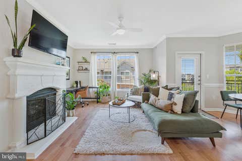 Photo of 12949 Centre Park Circle #408, HERNDON, VA 20171 (MLS # VAFX2329444)