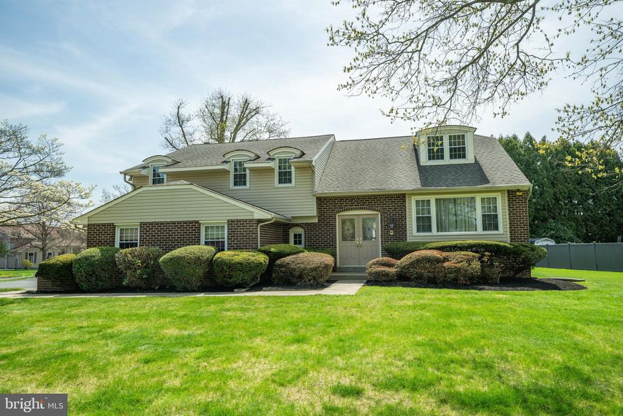 Welcome to this well-maintained  and spacious 4-bedroom, 2.5-bath home, ideally situated on a spacious corner lot in a highly desirable neighborhood within the sought-after Central Bucks School District.

Step inside to find a warm and inviting layout featuring a formal dining room, a functional and centrally-located eat-in kitchen, and an adjacent living room - all perfectly positioned for everyday living and easy entertaining. A comfortable family room with a cozy fireplace offers an additional gathering space and access to the rear yard and covered patio while a convenient powder room is found on this level as well. A main-floor laundry room adds everyday convenience, and the attached 2-car garage offers ample storage and parking. Hardwood flooring is present beneath much of the carpeting, offering the opportunity to restore its natural warmth and character. 

The upper level includes a spacious primary suite with a private ensuite bath, separate vanity area, and walk-in closet. Additional bedrooms are generously sized, with large closets and share a full hall bathroom. A short staircase leads to a sunny and private fourth bedroom, ideal for a home office, hobby room, or guest space.

The lower level offers a partially finished basement that was recently waterproofed, creating a clean, functional space with excellent potential for future customization. Exterior features include durable vinyl siding and classic brick,  along with newer roof and windows for added peace of mind. The home has been lovingly cared for over the years and is ready for its next chapter.

Enjoy a wonderful location close to parks, including a neighborhood playground within walking distance, and easy access to all the shopping, dining, and cultural amenities of nearby Doylestown Boro.

This is a rare opportunity to own a solid home in a sought-after location - don’t miss it! Showings begin April 24th.