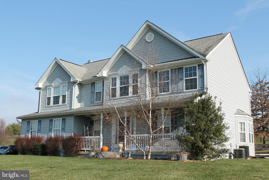 Spacious Colonial offers 2500 sq.ft.and the perfect location for the commuter.Formal LR/DR.Eat-in kitchen w/ island open to family room w/ wood fireplace. Fully equipped kitchen w/ white cabinetry, island and stainless appliances. Large master bedroom suite w/ cathedral ceiling,deluxe master bathroom and walk-in closets.Unfinished basement,2 car gar, deck, fenced rear yard. Situated on 1.6 acres