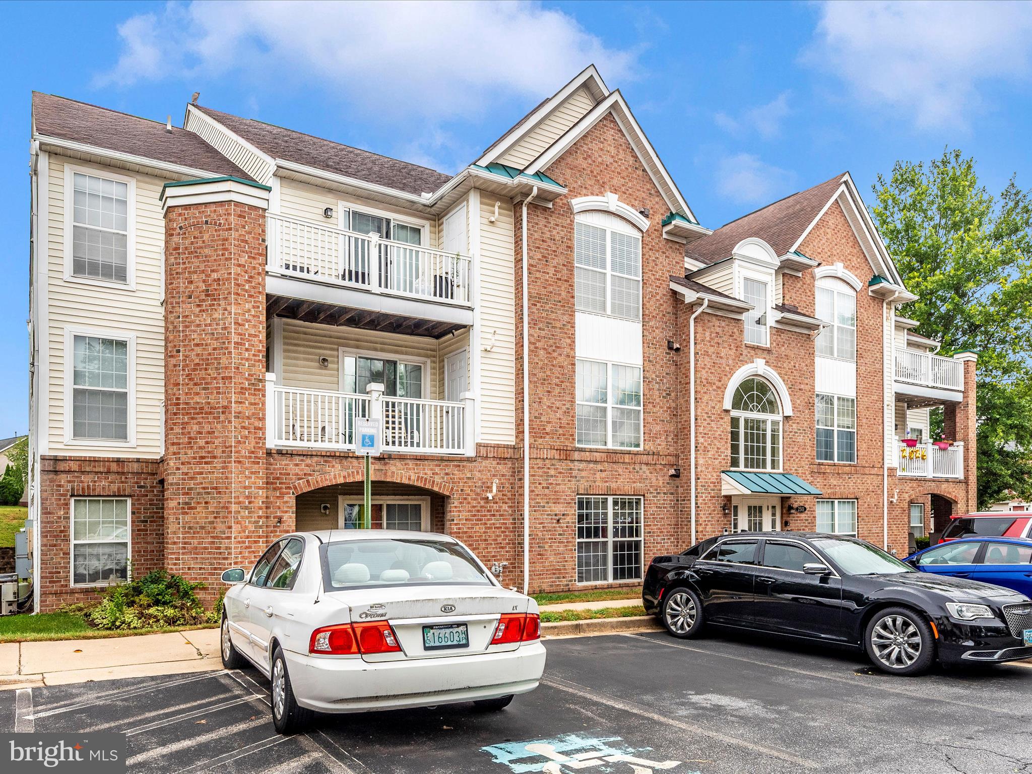 This top-floor condo in the Echo Glenn community offers two bedrooms and two full bathrooms with modern updates and a bright, open feel. The home features high ceilings, updated LVP flooring, and a spacious kitchen with fresh white cabinets. The open layout flows to a large balcony with a semi-private view, perfect for relaxing outdoors. The primary suite is filled with natural light and includes a spacious walk in closet and an en suite bath. Both bathrooms feature tile finishes, and the convenience of in-unit laundry makes everyday living a breeze. Enjoy community amenities including a pool and tot lots, all in a prime location close to shopping, dining, and commuter routes