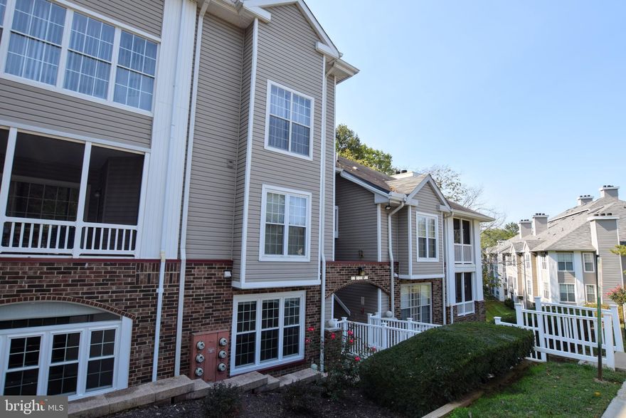 Light floods into this incredibly well maintained ground-level condo! Owner has lavished meticulous care to make this unit ready for the next Owner. Brand new stainless steel kitchen appliances including a five-burner electric range, upgraded dishwasher, and refrigerator with ice maker! New carpeting throughout the dining room, living room, and bedroom! Bathroom tastefully redone w/ large ceramic tile flooring.  This is the only home in the neighborhood with a back deck, which is set peacefully among the trees! The screened in porch provides a perfect respite with refreshing forest views and breezes.