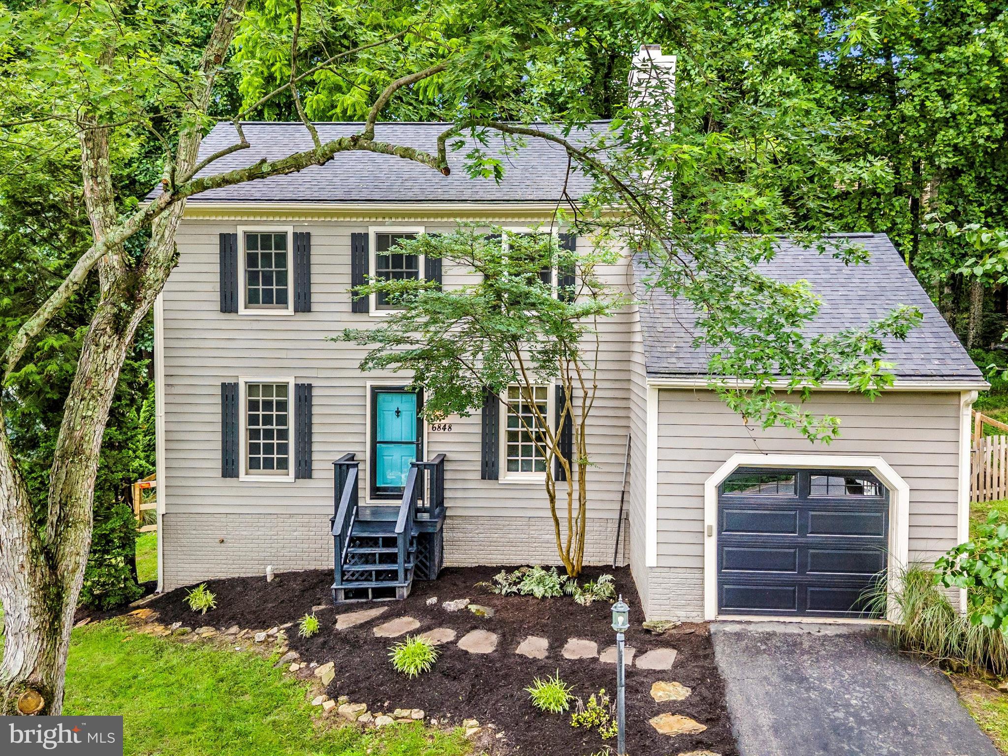 Open House Sunday, July 27, 11:00 am - 1:00 pm. Welcome to this delightful 3-bedroom, 2-bathroom home, complete with a serene backyard retreat located in Audubon Lake Linganore. Imagine spending your summers grilling and dining on the spacious, multi-tiered deck surrounded by nature. The kitchen boasts white cabinetry, stainless steel appliances, a double-basin farmhouse sink, wood butcher block countertops, and a cozy breakfast nook. During the cooler months, curl up by the wood-burning fireplace for warm and inviting evenings. The good-sized dining room is perfect for holiday gatherings and special occasions. A full bathroom is conveniently located on the main level. Upstairs, you'll find three bedrooms and a second full bathroom. The primary bedroom features a ceiling fan with light, and a walk-in closet outfitted with custom shelving. The second bedroom includes a ceiling fan with lighting, and charming chair rail molding. The recently renovated lower level offers a versatile den and a spacious family room with surround sound speakers—perfect for movie nights or watching the big game. Recent updates include a new roof (2020), replacement garage door, new garbage disposal, sump pump, new radon remediation system fan, and a brand-new rear fence (Spring 2024). Enjoy all that Lake Linganore community has to offer including multiple pools, basketball, beach volleyball, a navigable lake, several sandy beaches, boating, fishing, swimming, nature & biking trails, frisbee golf, pickle ball, playgrounds, soccer, sports fields, tennis courts, plus a Summer Concert Series under the stars, and so much more!