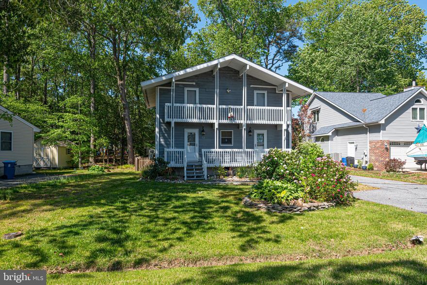 Adorable fully furnished Ocean Pines home just a 4‑minute walk to the little beach, marina, and S&R Club pool. Features include an updated kitchen with granite countertops and newer stainless appliances, cathedral ceilings, first‑floor bedroom and bath, loft area, attic storage, laminate flooring throughout, and updated bathrooms. Major updates: roof (2017), encapsulated crawl space w/ dehumidifier (2020), ductless HVAC (2020), pellet stove (2022), fenced yard (2022), storm doors (2022), interior paint (2023). Enjoy a screened‑in porch, rear deck, outdoor shower, large shed with workbench, and a spacious driveway with room for multiple cars and a boat. Move‑in ready and perfect as a full‑time residence, vacation home, or investment property.