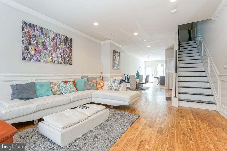 Beautiful 3 bedroom is now available in the heart of Point Breeze.  Spacious from top to bottom.  The first floor is bright and airy with an open floor plan, that leads to your south facing back patio.  The kitchen includes stainless stain appliances and quartz countertops.  The second floor features two large bedrooms , a  full hallway bathroom, and dedicated laundry room with washer & dryer.  The 3rd floor is a stunning master suite with wet bar/office area, and Juliet balcony.   The master bathroom  boasts a walk in shower with exported Canadian tile.  Continue up to the roof deck, with unobstructed city views, makes great space for entertaining.    The basement is finished throughout, and includes a built-in bar, and  current baby play area, and mechanic's room.  Take advantage of the shops and restaurants in the neighborhood.  Easy access to public transportation and major highways.