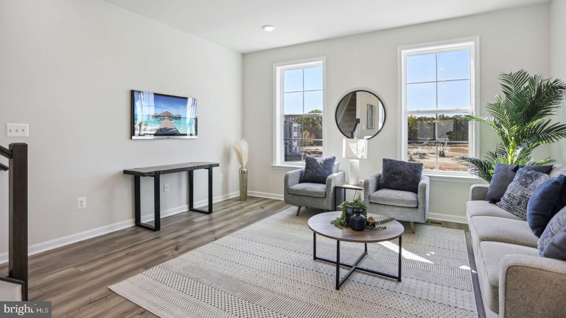 *OFFERING UP TO 25K IN CLOSING COST ASSISTANCE WITH USE OF PREFERRED LENDER AND TITLE.**Conventional financing with no mortgage insurance and/or 100% financing**
ANTICIPATED DELIVERY, AUGUST, 2025. WELCOME TO THE ABBEY - an open-concept townhome with modern finishes. Enter the home through the main entryway which lead into a foyer with bedroom and full bath. Wonderful option for parents or can be used as and office. Meander to the second level, you will discover the main living space comprised of a bright and sunny living room with a sliding glass door that leads to your deck. The kitchen is complete with a generous size island and separate dining room. The upper level feature 2 large bedrooms with separate bath and ample closet space. Separate laundry room completes the upper level, and additional hallway closet. This home has rear load garage and driveway for additional parking. *Photos may not be of the actual home. Photos may be of a similar home/floorplan if the home is under construction or if this is a base price listing.