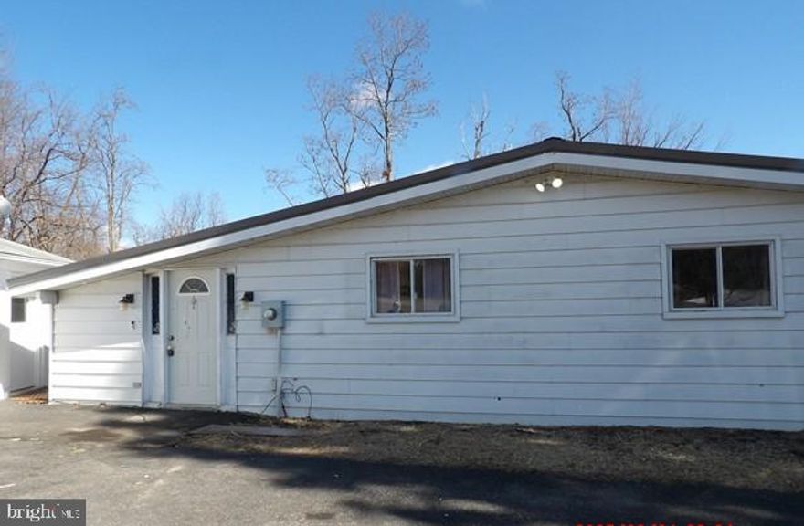 Single level living  with llarge kitchen wit table space.  Living room with a fireplace  on a nice lot with privacy.  Oversized garage  has great storage  Nice views and a private porch for peacesful evenings.