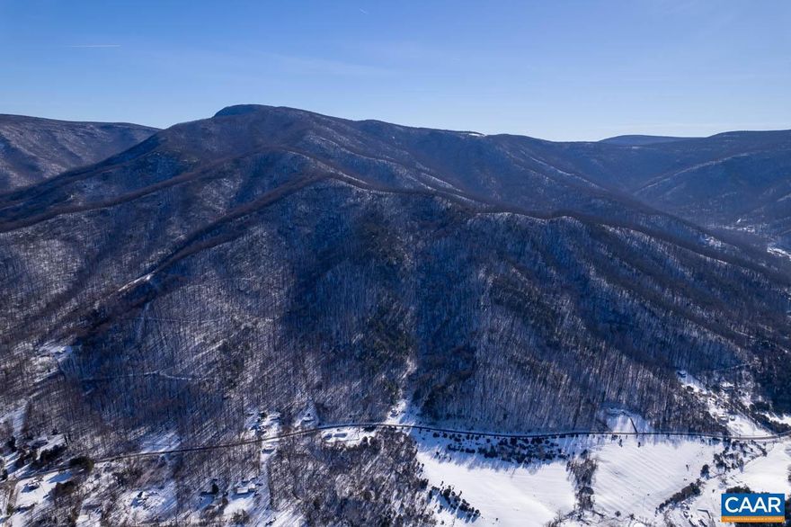 Nestled in the heart of Stanley, VA, this 305-acre parcel of mountain land, surrounded by the breathtaking beauty of the Shenandoah National Park, offers an unparalleled opportunity to immerse yourself in the natural wonders of the region. Encompassed by a conservation easement, this land is a sanctuary for nature enthusiasts and conservationists alike. Its protected status ensures that the unspoiled splendor of the landscape will endure for generations to come, making it a truly unique and valuable investment. Abundant wildlife, perfect for hunting and hiking, makes this property an outdoor enthusiast's dream.  With its protected status and breathtaking beauty, this parcel presents endless possibilities for creating a private retreat or hunting lodge while still being within reach of modern amenities.  Don't miss the chance to own this extraordinary 305-acre mountain oasis, where the beauty of nature knows no bounds and the possibilities are as vast as the land itself.  Sale does not include the homesite.,Balkamore Hill