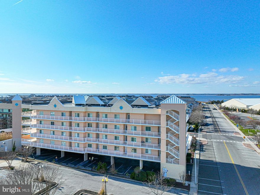 THIS IS AN AMAZING OPPORTUNITY to own a large 3 bedroom condo at 1563 sq ft with 2.5 baths that is across from Northside park, 2 short blocks to the beach and a front door glimpse of the ocean! The open floor plan includes a large kitchen with breakfast bar, dining area and living room with a gas fireplace. Off of the living room there is access to the covered balcony that offers views of Northside Park so you can enjoy the fireworks shows that Ocean City will provide through out the year including 4th of July and the Winter Fest light show. The owner's suite has access to the balcony, comes with a walk-in closet, has an attached full bath with dual vanity sink, jetted tub and a separate shower. This well maintained condo includes sprinklers, crown molding, recessed lighting, and was just freshly painted. The property has a full size washer and dryer and the water heater was replaced in 2019. The Lorelei is professionally managed and offers an outdoor pool, elevator, ground level storage lockers, on-site parking and gas is included in the condo fee. Lorelei is located Bayside block in North Ocean City at 125th St. diagonal to Northside Park and is also convenient to the beach, many restaurants, shopping, grocery stores, miniature golf, movie theater and much more! Don't miss out on this Ocean City gem!! This property could also be used as an income producing rental!