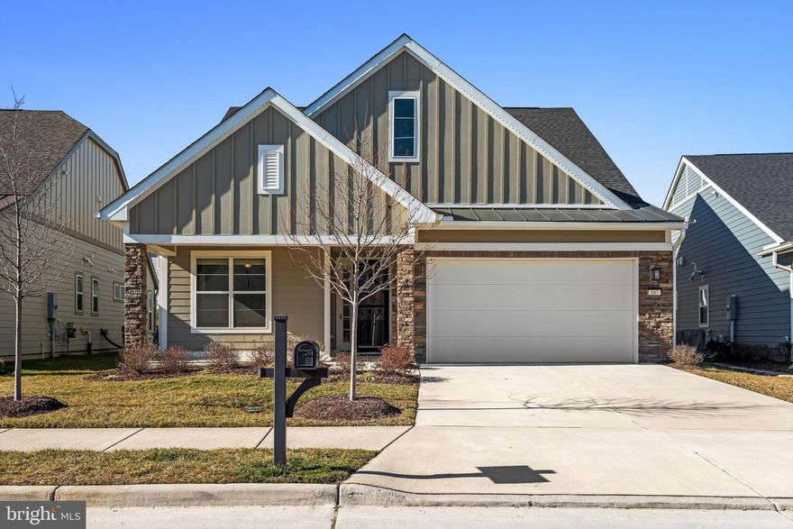 Experience the best of one-level living in the vibrant 55+ community of Trilogy at Lake Frederick. Step inside this stunning Aspen model home and be captivated by its charm and functionality. With 3 bedrooms and 2 bathrooms all conveniently located on a single level, this home offers an effortless and accessible lifestyle.  As you enter, you'll be greeted by an open floor plan that seamlessly connects the living, dining, and kitchen areas. The gas fireplace creates a cozy ambiance, perfect for hosting gatherings with friends and neighbors. The covered back porch has been transformed into an all-season room, providing a versatile space that can be enjoyed year-round.  The Primary Bedroom is a haven of relaxation, featuring a charming window box where you can sit back and enjoy a good book or simply savor a cup of coffee while basking in the beauty of the outdoors. The primary bathroom is equally impressive, boasting separate vanities and a spacious walk-in shower.  Practicality meets style with laminate floors throughout the bedrooms and main living areas, offering both durability and ease of maintenance. The bathrooms and laundry room are adorned with elegant tile floors.  For pet owners, the fenced backyard is a delightful bonus, providing a safe and secure area for your furry friends to roam and play to their heart's content. But Trilogy at Lake Frederick is more than just a place to call home. It's a vibrant community that offers an array of clubs and activities to suit every interest. Whether you prefer taking a dip in the indoor or outdoor pools, challenging friends to a game of pickleball, honing your billiards skills, practicing your swing in the indoor golf simulator, getting your heart pumping in the fitness center, or unleashing your creativity in the arts and crafts room, there is always something exciting to do. Embrace the retirement you've always dreamed of in this top-notch community that combines luxury, convenience, and an active lifestyle. Come and discover the joy of one-level living at Trilogy at Lake Frederick.