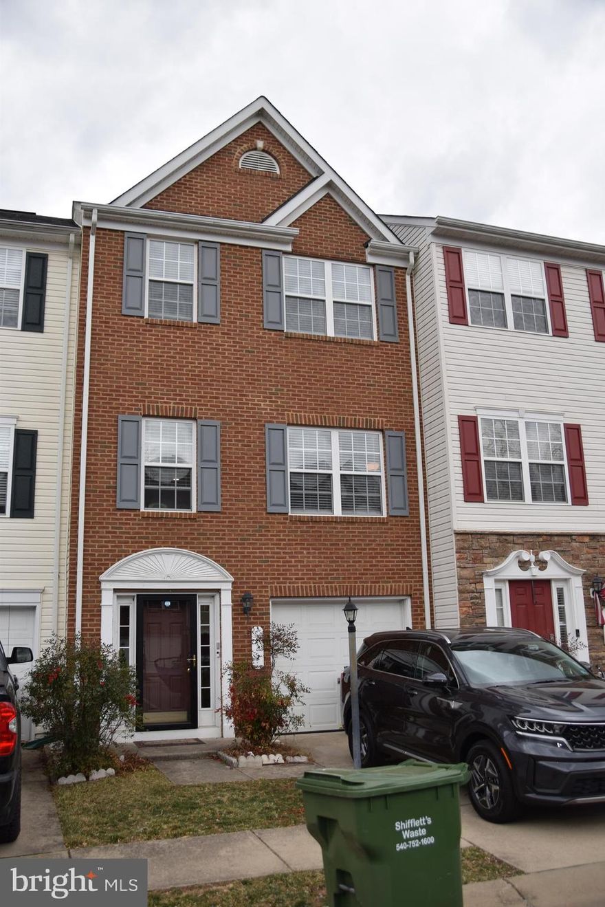 Gorgeous 3 level brick front townhouse, in a desirable community with very quick access to I 95 Hot lane ramp, or Rt 1. Large master bedroom with a private bath on the top level and two sizable bedrooms. Bright bruce hardwood covers the main level where you have the spacious kitchen with an island. Rec room and 1/2 bath on lower level. Large deck overlooks the fenced backyard. New in the house include, Stainless Steel refrigerator, dishwasher, stove , washer and dryer, carpet, HVAC, vertical blinds. etc. Large deck overlooks the fenced backyard. ADT security available. Tenant pays HOA fees.