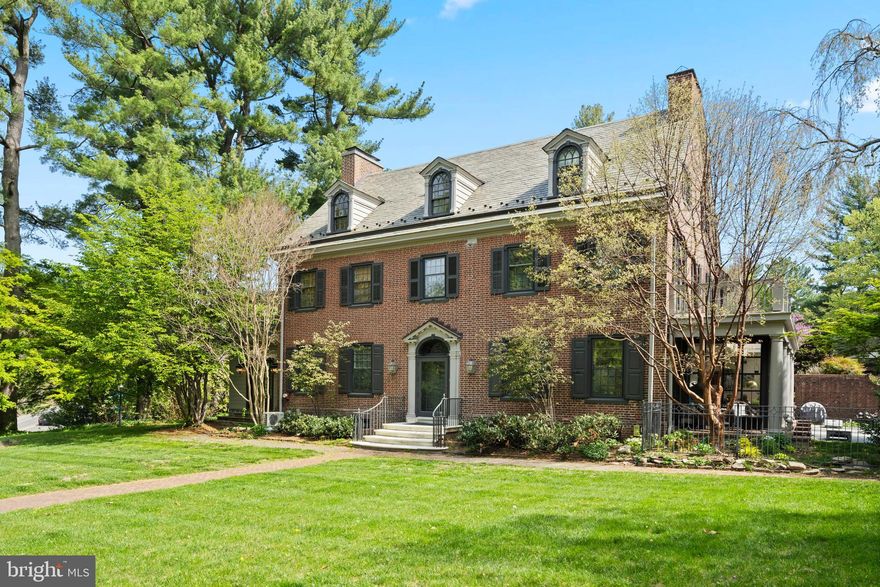 Elevated above Saint Martin's Lane, this 1909 Chestnut Hill estate on 1.3 acres blends classic historic architecture and contemporary living in a location that stands out above the rest. The 6-bedroom, 5.5-bath main residence features a sun-drenched, expanded kitchen with skylights a wall of glass and French doors leading to a bluestone patio over looking the lap pool, ideal for entertaining. A spacious living room with a fireplace and built-ins, and a dining room with pocket doors, offer elegant living spaces. There is a beautiful solarium addition off the living room perfect for gym or study. The primary suite offers a fireplace, balcony, and spa-like bath. Two additional spacious bedrooms sit on the second level accompanied by a beautifully tiled hall bath. The third floor offers three bedrooms, including one with vaulted ceilings and exposed beams plus two full baths.

The Little House with two car garage was constructed in 1922 for the original owner, Helen P. Seabrease, to right size into. The 1,925 sq ft little brick home has been completely restored from top to bottom and provides a great room with fire place and a wall of French doors that overlook the gorgeous lap pool with sophisticated hardscaping. The one-of-a-kind Little House is storied to have been a refuge for two US Presidents who visited as overnight guests and offers a full kitchen, two bedrooms, a changing room with half bath, and a beautifully remodeled full bath.  

The award-winning gardens are sprinkled with native plantings and and an abundance of rare specimen trees. Invisible in plain sight, this location is simply incredible. Situated in the heart of Chestnut Hill, the property is within a short hop to the village, the endless foot paths of the Wissahickon Valley and all of the social resources available in the area, including schools, regional rail to Center City and beyond. The property is in impeccable condition and comes equipped with six zone heating and air conditioning for ease of living. This exceptional estate home offers unparalleled convenience and timeless elegance. Come, make 8219 Saint Martins yours.
