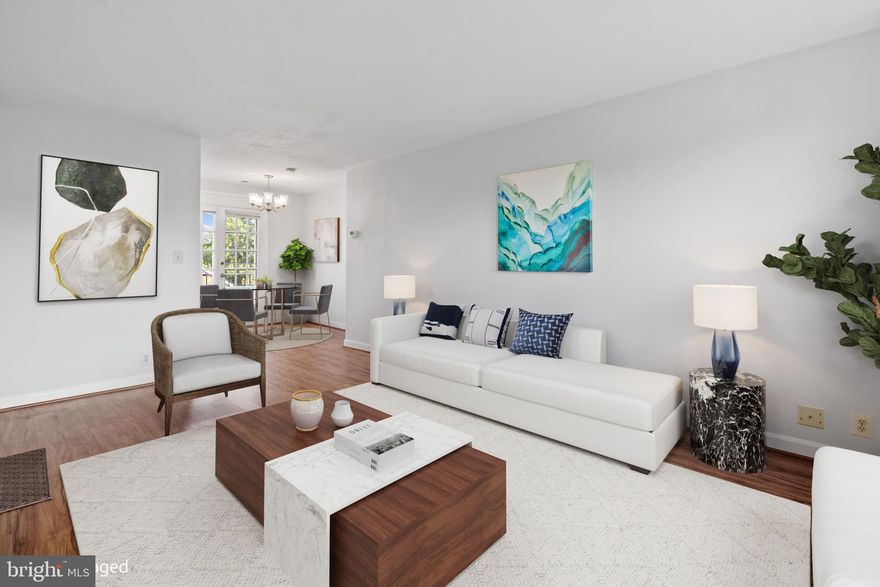 Offer deadline - Monday, 9/18 at 3PM - Rare TOP LEVEL unit in sought after Fairlington Villages! This charming unit offers a welcoming open layout with a spacious living room, sunny dining area, and light-filled kitchen featuring fresh white cabinets, stylish backsplash, reach-in pantry cabinets, and granite counters. The recently updated full bathroom boasts new tile flooring, fresh paint, and brand new vanity! In the large primary bedroom, you'll love having windows on two sides of the room, as well as a walk-in closet! Enjoy FRESH soft gray paint and luxury vinyl plank flooring throughout! Laundry worries are a thing of the past with the in-unit front loading washer/dryer and convenient adjacent shelving. Need more storage? No problem! Because this is a top-floor unit, you'll find an additional walk-in closet and LARGE ATTIC w/ pulldown ladder access for all your storage needs and possible future expansion plans (examples available)! Looking for some fresh air? Enjoy relaxing alone or entertaining friends on the large private balcony right off the dining room! Each unit can have up to 2 parking permits + additional guest passes. Fairlington Villages offers a wide variety of FANTASTIC amenities, including multiple pools, several sports courts (tennis, pickleball, basketball), playgrounds, and more! Unbeatable location near the exciting shopping, dining, and entertainment of Village at Shirlington, as well as convenient to Arlington, Old Town Alexandria, D.C. and more!