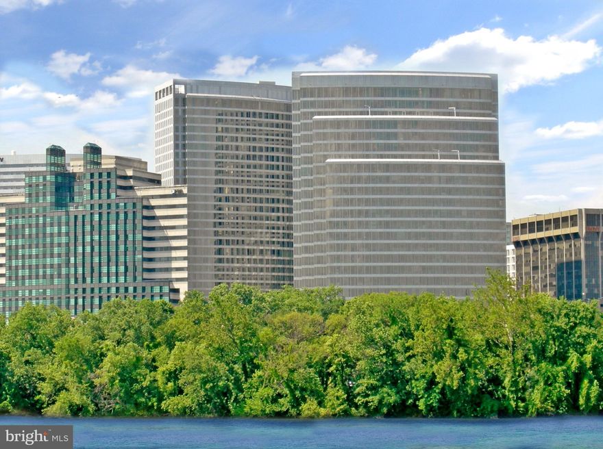 Beautiful, stunning, and rarely available 24th floor penthouse  for sale at Waterview with spectacular views of Georgetown and the Potomac River from every window.  This contemporary-style 1525 sq. ft.  two bedroom, two and a half bath condominium abounds with quality and luxury details including a built-in study nook, brand new porcelain tile flooring and an entirely new renovated kitchen with solid wood custom cabinets, Miele appliances and show-stopping quartz waterfall counter tops.  Other features of this immaculate property include a gas range, built-in refrigerator, convection microwave and warming drawer, Bosch washer and dryer, marble bathrooms with Wood Mode cabinetry, floor to ceiling windows with privacy shades, and a tandem parking space for two cars in the underground garage.  Amenities include a residents lounge, 24/7 concierge services and an on-site property manager.  The Meridien Hotel occupies the first twelve floors of the building, and residents enjoy access to the facilities and services of the hotel including room service and the fitness center.  The roof top terrace on the 31st floor, exclusively for condominium residents, offers the opportunity to grill outdoors while taking in the magnificent world-class panoramic views.  Built in 2008, Waterview is a contemporary style building located in the heart of Rosslyn and designed by internationally renowned architects Pei Cobb Freed & Partners. The recipient of numerous design awards over the years, Pei Cobb Freed stand at the forefront of modern architecture, and are best known for their dramatic expansion and modernization of the Louvre in Paris.  Located at the foot of Key Bridge, the property is ideally located just steps from Rosslyn metro station, less than half a mile from Georgetown and downtown DC, and just 10 minutes to Reagan National Airport.