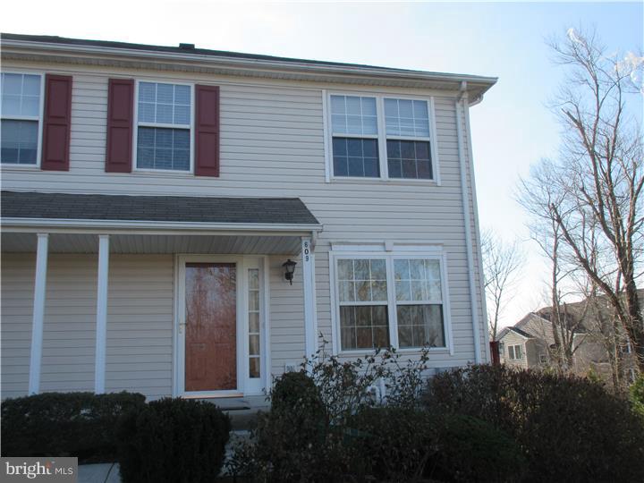 The location of this 2 bedroom, 1 1/2 bath END UNIT in Bradford Greene is fantastic. The main floor of this townhouse features hardwood floors in the living room and dining room, a powder room and a full kitchen. The dining room leads to a large (just re-stained)deck with gorgeous views of the front and side yard. Privacy is a big plus with this end unit. The second floor features two nice size bedrooms (one freshly painted)with walk in closets and a full bath. The basement has plenty of storage space, washer/dryer and an almost new gas water heater. Award winning Central Bucks Schools, great shopping and restaurants nearby are all a nice bonus. Conveniently located to Rt.309, Rt.611 and Rt.202. Don't miss out on this one, it won't last!
