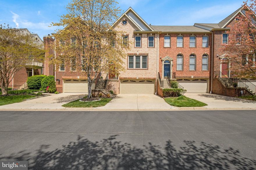 Pride of ownership shows in this meticulously-maintained three level townhome in the always popular Crestmont Townhouses community!  Attractive brick front and lush landscaping create a welcoming curb appeal! The spacious main level offers gleaming hardwood flooring; 9 foot ceilings; a cozy 3-sided gas fireplace & convenient powder room with custom millwork! Light & bright rear kitchen with 42" white cabinetry; granite countertops; SS appliances; a center island with gas cooktop; functional desk area; and a comfortable sitting area that's perfect for socializing with the cook! The three-panel full view door provides direct access to the spacious deck backing to green HOA area! The upper level provides three large bedrooms along with two full bathrooms and convenient laundry area.  The primary bedroom suite boasts vaulted ceilings; ceiling fan; and walk-in closet while the sumptuous en suite bath soothes you with a jetted soaking tub; expansive two-bowl vanity; fabulous skylight w/ UV coating & luxurious frameless shower! Plan to spend plenty of time enjoying the fully-finished lower level complete with spacious recreation room; custom built-ins; full bath with tub/shower & walk-out to the fully-fenced rear yard with slate paver patio! The two-car front-load garage features RaceDeck flooring and an extra-large storage area plus additional under-stair storage. Upgrades to this wonderful home include: tankless gas water heater; ADA toilets; newer HVAC; whole house water filtration system; custom window blinds & Simonton replacement windows & door! Outstanding location within blocks of charming Old Town Fairfax with plenty of shopping & dining options; Fairfax City Regional Library; George Mason Univ campus; and close to outdoor recreation including Van Dyck Park; Daniels Run Park; Army-Navy Country Club plus more! Quick access to major commute routes including RTs123/50/29 & I-66! This one has it all!