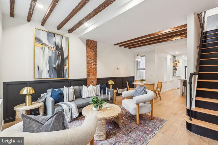 Welcome to 637 Belgrade Street, a beautifully renovated brick-front home situated on a fantastic block in the heart of Fishtown with a pending 10 year tax abatement!This move-in ready residence seamlessly blends original charm with modern upgrades, offering 3 spacious bedrooms, 1.5 bathrooms, and a private outdoor space perfect for relaxing or entertaining.

Step inside to an open-concept living and dining area featuring wide plank white oak hardwood floors, exposed brick, recessed lighting, and reclaimed wood details that add warmth and character throughout. The bright and stylish kitchen is equipped with quartz countertops, modern shaker cabinetry, a designer tile backsplash, and a full stainless steel appliance package.

Just behind the kitchen, you’ll find a convenient first-floor powder room and a washer/dryer closet for added functionality. Step outside to the fenced-in backyard, ideal for gatherings, gardening, or pets.

How about the custom reclaimed wood “secret door” to go downstairs to the large unfinished basement. Perfect for extra storage,  a potential at home speakeasy, or an extra bonus living area. 

Upstairs, the second floor offers three generously sized bedrooms, including a primary bedroom with ample closet space. The updated full bathroom features a tiled tub surround and brass and moody  accents for a touch of rustic elegance.

Additional upgrades include all new HVAC, electrical, plumbing, windows, and roof—everything has been done for you. A pending 10-year tax abatement adds incredible value to this thoughtfully renovated home.

Located just steps from Fishtown’s best restaurants, coffee shops, bars, and public transportation—637 Belgrade Street is a must-see!