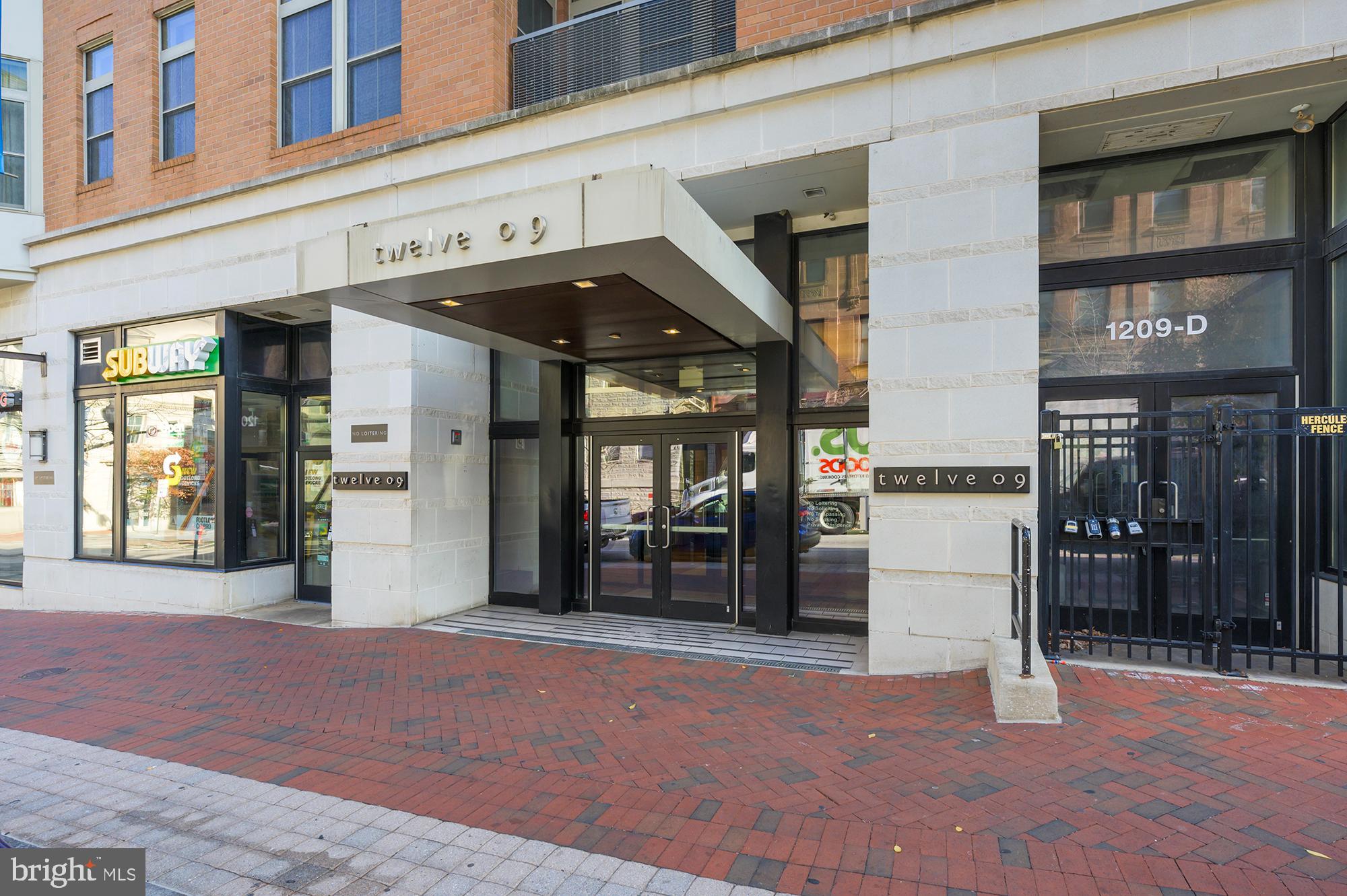 Welcome to 1209 N Charles Street. With its luxurious interiors and well-considered features, this fully furnished two-bedroom, two-bathroom unit offers a luxurious lifestyle. This unit, which offers the ideal balance of comfort and luxury, is tucked away in the center of Baltimore next to Mount Vernon. The roomy design features a separate den/office that is perfect for studying or working remotely. Both bedrooms offer ample closet space for all your storage needs. Step into two beautifully finished full bathrooms with gold finishes and custom designs, giving you the perfect space to relax. A peaceful haven in the middle of the city, step onto your private terrace and enjoy views of the fountain and peaceful courtyard. The property features facilities like a fully furnished gym, an outdoor fireplace, and a lovely courtyard with a fountain. There are two covered garage parking spots available for a monthly cost. Water is part of the rent, all other utilities are separate. Make an appointment for your tour today to take advantage of this exceptional and unique opportunity to live in the city in style while enjoying all the modern amenities! Pets allowed on a case by case basis with an additional monthly fee.
Water is part of the rent. All other utilities are separate. Pets allowed on a case to case basis with an additional monthly fee. $50 -$75 per parking spot added to rent.