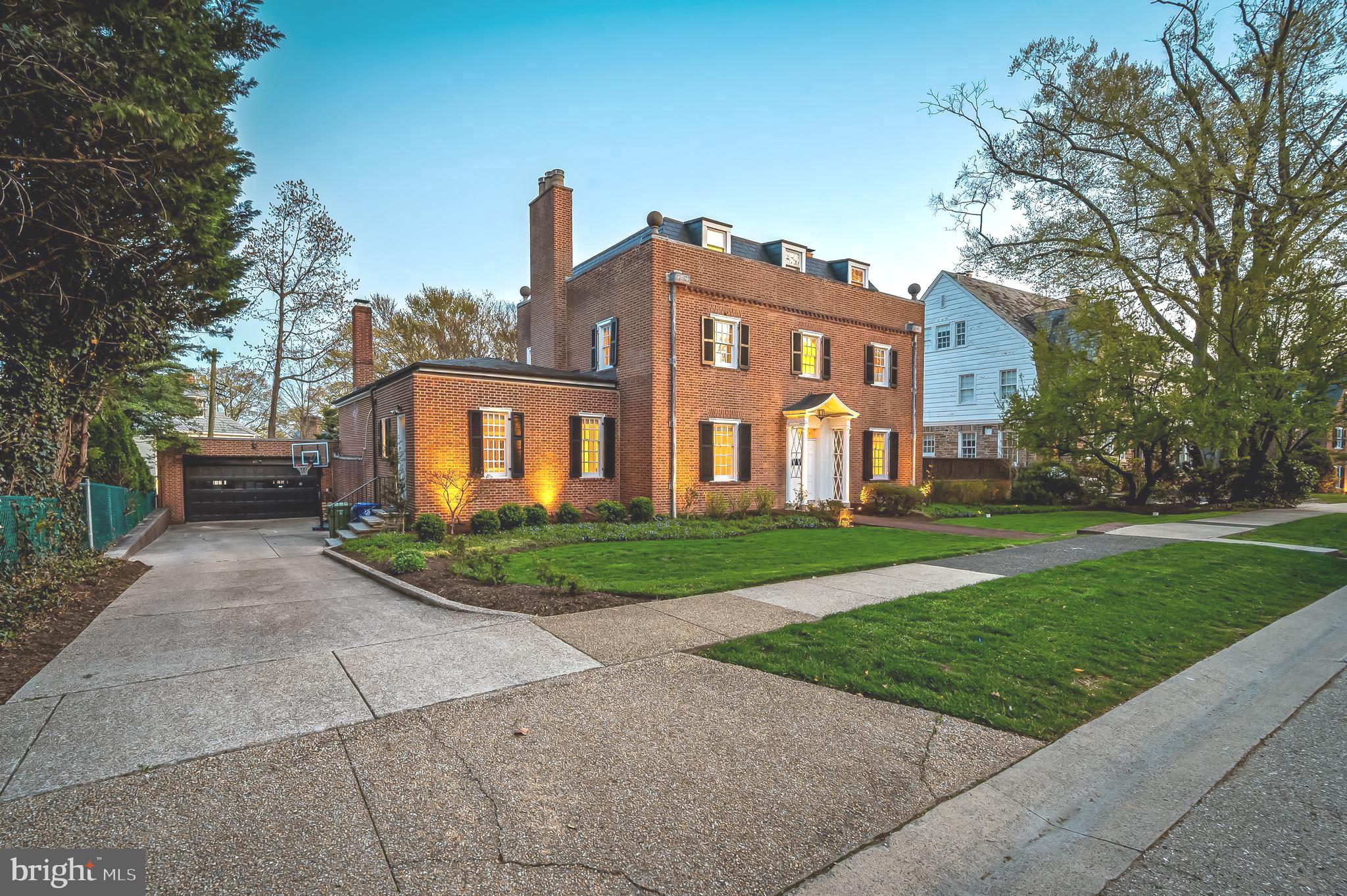 OWNERS OF THIS BEAUTIFUL HOME HAVE NOW REDUCED THE PRICE BY $150,000. Step inside this timeless Georgian-style masterpiece! Here we have an exquisite, all-brick Colonial home, designed by renowned Baltimore architect Laurence Hall Fowler in 1925. This home, with its classic proportions, offers 12 ft. ceilings in the Great Room and 9 ft. ceilings throughout the rest of the home. We are a short two block walk to Sherwood Gardens, and close to JHU, Loyola and other major universities as well as many restaurants and cafes. Our home offers a perfect blend of historic charm and modern updates. This stately residence boasts five generously sized bedrooms, three and a half baths, and expansive living spaces. The home features five fireplaces, including a custom-built outdoor fireplace perfect for entertaining. As you enter, you’re greeted by a grand foyer with striking curved walls, built-ins, and an elegant wide staircase that wraps around to the second floor. A conveniently located half-bath and coat closet are also found here. Just beyond the foyer, the spacious living room features floor-to-ceiling windows and French doors leading out to the backyard, while another set of French doors connects to the formal dining room. A third set of French doors opens to the gargantuan (16 ft by 27 ft) Great Room with 12 foot ceilings making this home ideal for both relaxation and entertaining. Recent updates have seamlessly blended with the original character of the home, including hardwood floors, a remodeled kitchen with an updated pantry and also features super high-end stainless steel appliances, three sinks, two dishwashers, and MORE. There is a thoughtfully redesigned third floor and a large, finished lower level room now used as a fitness area. This home has it all. The garden changes with the seasons. One can sit in the garden and the outside world seems far away. Modern conveniences include multi-zone (3) air conditioning with a Space-Pak system to service the upper floors, basement waterproofing with two sump pumps, and a 75-gallon water heater. An integrated indoor/outdoor SONOS music system adds to the home’s luxury and convenience. Don’t miss your opportunity to tour this remarkable property and experience the perfect balance of old-world craftsmanship and comfort. Make an appointment today!