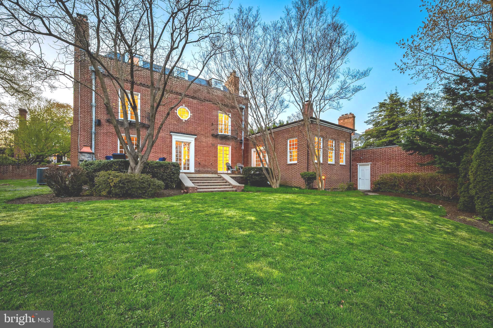 OWNERS OF THIS BEAUTIFUL HOME HAVE NOW REDUCED THE PRICE HERE $100,000 ON THIS LOVELY HOME. Step Inside This Timeless Georgian-style Masterpiece! This is an exquisite, all-brick Colonial home, designed by renowned Baltimore architect Laurence Hall Fowler in 1925. Offering a perfect blend of historic charm and modern updates, this stately residence boasts five generously sized bedrooms, three and a half baths, and expansive living spaces with nine-foot-plus ceilings. The home features five fireplaces, including a custom-built outdoor fireplace perfect for entertaining. As you enter, you’re greeted by a grand foyer with striking curved walls, built-ins, and an elegant wide staircase that wraps around to the second floor. A conveniently located half-bath and coat closet are also found here. Just beyond the foyer, the spacious living room features floor-to-ceiling windows and French doors leading out to the backyard, while another set of French doors connects to the formal dining room. A third set of French doors opens to the gargantuan (16.10 by 27 feet) Great Room with 11+ foot ceilings making this home ideal for both relaxation and entertaining. Recent updates have seamlessly blended with the original character of the home, including hardwood floors, a remodeled kitchen with an updated pantry and also features super high-end stainless steel appliances, three sinks, two dishwashers, and MORE. There is athoughtfully redesigned third floor and a large, finished lower level room now used as a fitness area. This home has it all. The garden changes with the seasons. One can sit in the garden and the outside world seems far away. Modern conveniences include multi-zone (3) air conditioning with a Space-Pak system to service the upper floors, basement waterproofing with two sump pumps, and a 75-gallon water heater. An integrated indoor/outdoor SONOS music system adds to the home’s luxury and convenience. Don’t miss your opportunity to tour this remarkable property and experience the perfect balance of old-world craftsmanship and comfort. Make an appointment today!