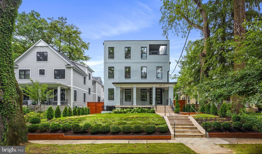 Discover the pinnacle of refined living at 3711 Livingston Street, NW, a meticulously renovated residence in Chevy Chase, where classic elegance harmonizes with modern luxury. This expansive home encompasses 6,679 square feet of thoughtfully designed living space, featuring seven bedrooms, seven full baths, and one half bath. As you enter, you are greeted by the warmth of newly refinished red oak hardwood floors that flow seamlessly throughout.

The heart of this home is undoubtedly the chef-inspired kitchen, a culinary masterpiece crafted with custom German-imported Leicht cabinetry, pristine quartz countertops, and a suite of top-of-the-line Thermador appliances. Designed by Elite Kitchens, this space is both beautiful and functional, catering to the most discerning culinary enthusiast. The first level is further enhanced by elegant coffered ceilings and a cozy gas fireplace, creating an inviting atmosphere for both casual living and formal entertaining.

Each of the seven bedrooms offers its own private en-suite bath, ensuring comfort and privacy for all. The primary suite, occupying the entire top floor, is a true retreat, featuring a private deck, two generously sized primary closets, and a spa-like bathroom with a luxurious soaking tub. An elevator provides easy access to all four levels of the home.

Additional highlights include a separate ADU unit above the garage, complete with its own kitchen, washer, and dryer. Outside, enjoy a back patio, front porch, rooftop deck, and open backyard. With a one-car garage and a two-car secure/gated parking pad, parking is a breeze.

Located just a block from Connecticut Avenue, you're steps away from the area's finest shops, restaurants, and amenities, including Starbucks, Comet Ping Pong, Politics and Prose, and more. 3711 Livingston Street offers not just a home, but a lifestyle of unparalleled luxury and convenience.