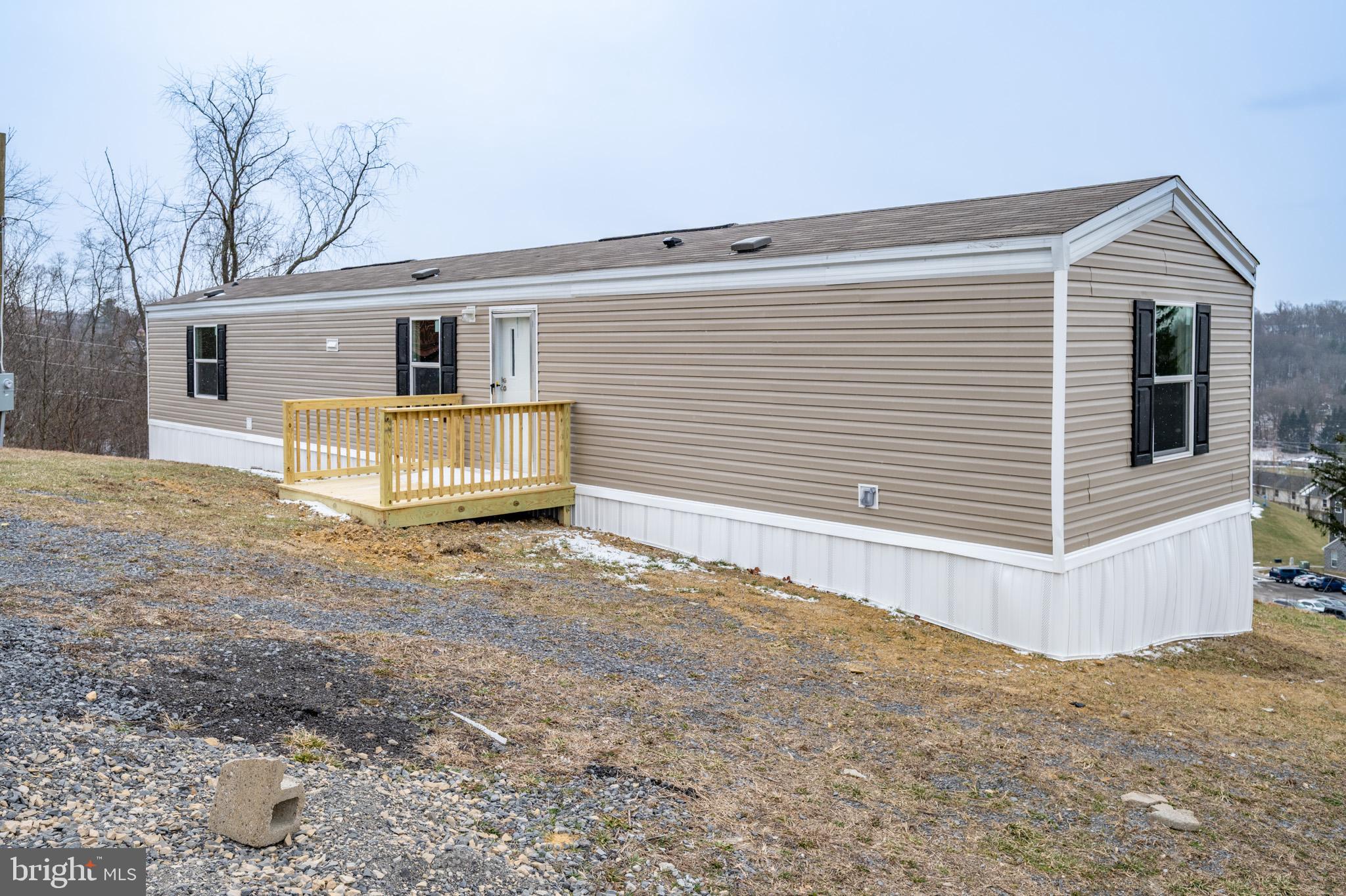 Quality, affordable living in Morgantown. Brand new/never lived in. Just minutes from the university, hospitals, shopping, and the interstate. Brand New single wide trailer in Saint Clairs Village. Open floor plan including the kitchen, living room, and dining area. There is also a separate laundry room, three good size bedrooms, and two full bathrooms. Outside there is parking and a nice, level yard. Call today to schedule a time to see this beautiful home.