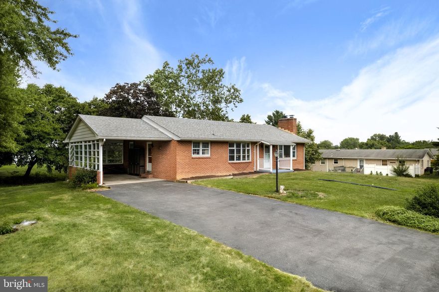 A charming 4 bedroom, 2.5 bath brick rambler with so many possibilities nestled in the Shenandoah Valley! This established neighborhood boasts large yards, gently rolling hills, and wooded areas.  The property has a quiet, country feel to it while being so close to restaurants, shopping, historic downtown, and Winchester Medical Center.  There are 2 wood-burning fireplaces, original, gleaming hardwood floors, and all the 1970s charm of a well-maintained Rancher home has to offer. A bedroom with an en suite in the basement is a great opportunity for multi-generational living or more. The master bedroom has a 3/4 en suite too. Located just off Rt. 7 and Senseny Road - a perfect commuter location! AC & Furnace is 1 year old, the roof is approximately 5 years young, sewer drain line to the street was replaced in 2019.