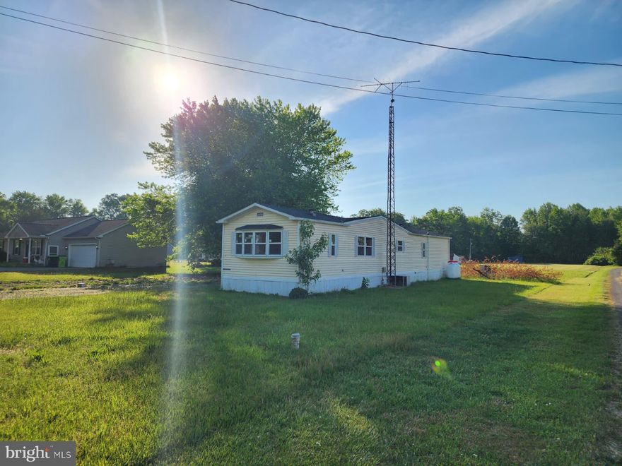 Investor alert! Situated on a half-acre lot in Dover, this single-wide home with addition  offers a great opportunity for investors, flippers, or buyers looking to put in some sweat equity. Featuring 2 bedrooms and 2 full baths, the home offers a surprisingly spacious layout complete with a living room, dining area, kitchen, built-in cabinetry, and plenty of potential throughout.

Several improvements have already been completed, including a new roof, new windows, new flooring, new water heater and a new garden tub. With no HOA restrictions, there’s flexibility to make this property your own!

Property is being sold AS-IS and will require TLC, but for the right buyer, the possibilities are there. Whether you're searching for your next investment project, rental opportunity or affordable home with room to improve, this property is worth a look!