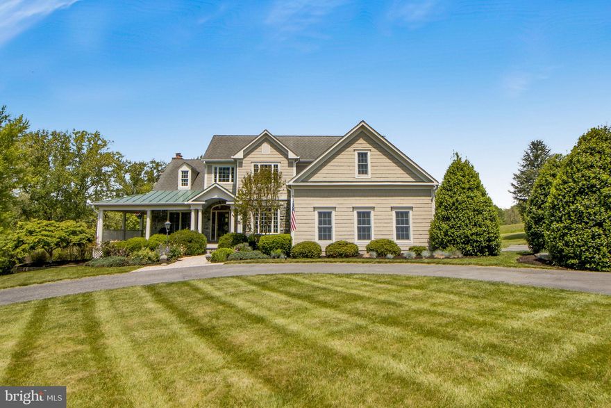 Welcome to this exceptional, private, 35+ acre estate in the heart of the Montgomery County’s Agricultural Reserve.  Built by renowned Wexford Homes in 2002, this 5,779 sq. ft. home features 4 bedrooms and 4 full and 1 half baths. Wrap around porch welcomes you to the bright light filled foyer. Gleaming natural hardwood floors and 9 ft. ceilings make this home warm and inviting. Office with access to the porch is perfect for working from home with hi-speed FIOS internet. Formal dining room with wainscoting and crown molding are just some of the custom design elements you will find throughout this home. Living room features a gas fireplace and access to the rear Trex deck. Gorgeous Anderson windows allow for beautiful pastoral views from all rooms. Kitchen has rich cherry cabinetry, granite countertops, and stainless steel appliances including a double wall oven and gas cooktop. Kitchen sink has reverse osmosis water filter and sunny breakfast nook. Spectacular main level owner’s suite has large bath with separate tub and shower, tray ceiling and walk-in closet. The upper level has a second en suite with private full bathroom, as well as two additional bedrooms that each have their own bathrooms with a shared shower between. The walk-out lower level is just as impressive as the rest of the house with 10ft. ceilings, huge “L” shaped recreation/game room and wood burning fireplace. There is a full bath and second kitchen as well as a multi-purpose room that could be a personal gym or office with lots of natural light. Asphalt driveway leads to the oversized side-load 2-car garage with extra tall garage doors to accommodate large SUV plus ample storage above with pull down stairs and floored attic. Brand new Carrier Infinity HVAC system. 400 amp. electric service already in place allows for plenty of power to add a charging station. Little Monocacy River traverses two sides of this beautiful property. Enjoy the vegetable garden with deer fencing surround. Security System, Generator and did I mention top rated  Poolesville schools? Barnesville & Dickerson MARC Train Stations, farmer’s markets, vineyards and craft breweries are all nearby. Rare opportunity to own this stunning property with a beautiful home at the base of Sugarloaf Mountain.