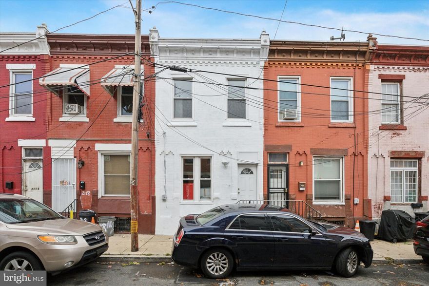 Welcome to 2120 Marston Street in the heart of 19121! Fully renovated top to bottom this 3 bed/1 bath home is modern, clean and stylish. The floor plan is bright and spacious with hardwood flooring throughout and Central A/C. The generous living space hosts an open floor plan with soaring ceilings. Including stylish light fixture designating the ample room for your dining table and chairs. Flowing into the kitchen you will find sleek white quartz countertops, modern cabinetry, stainless steel range, dishwasher and microwave. Well designed for entertaining and cooking the kitchen is highlighted with cabinet height marble-esque tile backsplash. The back concrete patio is again spacious and fenced-perfect for backyard Bbq’s and relaxing.The black metal stairwell opens to the second floor where you find three light filed bedrooms each with closets on the second floor. The contemporary fully tiled bath is streaming with natural light and has stylish grey vanity and modern lighting fixture. Loads of extra living, entertaining and storage space in the fully finished basement with tucked away closet for mechanicals and laundry hook-up.1 block walk to Richard R. Wright Elementary School.10 minute walk to Fairmount Park and the Joseph E. Mander Playground & Fairmount Park Tennis Courts. 5 minute drive to the DEL and Fairmount Park's historical sites. 30 minute or less bus commute into Center City. Minutes commute to 76 & Kelly Drive!