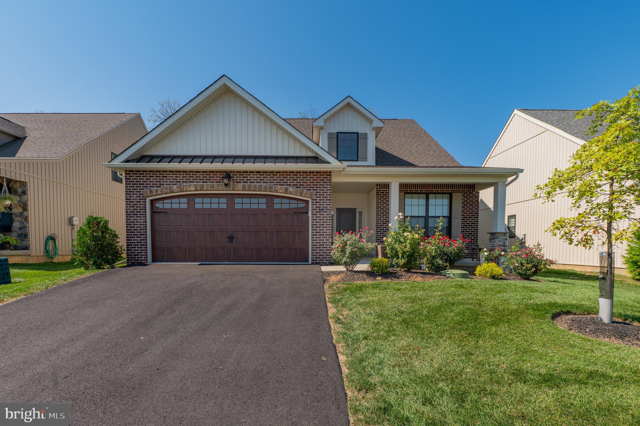 Discover the perfect blend of style, comfort and convenience in the desirable Fields at Indian Creek 55+ community. This move-in ready 2-year-old home boasts 3 spacious bedrooms and 3 full baths, including a roomy primary suite with WIC, large bath w/double vanity, tile shower w/bench seat, and water closet. The open-concept kitchen, living room, and dining room create a welcome space for entertaining, highlighted by cathedral ceilings, gas fireplace, and engineered hardwood flooring. The bright kitchen has a large center island, quartz countertops, 42" cabinets, stainless appliances, and a tile backsplash. Additional features include first-floor laundry, wider hallways and doors, oversized 2-car garage with EV charging station, and high-end upgrades throughout. The 2nd floor contains a spacious loft area, bedroom and full bath. The huge basement has an outside entrance, 9’ ceiling, epoxy flooring—perfect for storage or ready to be finished. This vibrant community boasts premium amenities including a heated outdoor pool, pickleball and bocce courts, and walking trails. The clubhouse offers a fitness center, meeting rooms, library, and fully accessible kitchen, providing endless opportunities for recreation and socialization. Monthly HOA fees cover trash/recycling, snow removal, landscaping, and lawn maintenance. The home has been meticulously maintained and is conveniently located with easy access to major roadways, restaurants, hospitals, and shops.