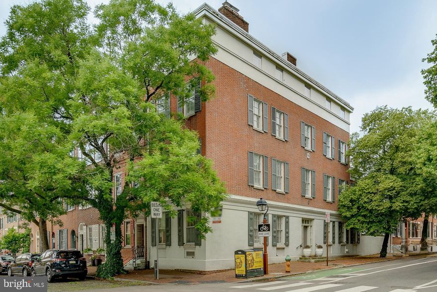 The centuries-old cobblestone streets and red brick sidewalks of historic Society Hill act as the backdrop for 200 Spruce St. Thomas U. Walter, founding member of the American Institute of Architects, designed and built this 6 bed, 5.5 bath sunlit corner residence in 1837, and it has been thoughtfully maintained and upgraded every since. Highlights include 6-zoned HVAC, an elevator serving all levels, a private patio with a street entrance, and bonus living space in the finished basement. The home's stately exterior is classic Philadelphia, with a mix of stone and brick accented by window shutters and mature trees. Inside you're welcomed by a foyer with a show-stopping wood and metal center staircase, an elevator, a powder room, and a coat closet. At the front of this level, soaring ceilings, tall windows, and beautiful hardwoods frame the bright and airy living room. A stone fireplace anchors the space, while a wet bar aids in entertaining. Limestone tile floors extend from the dining room to the gourmet kitchen at the rear. Fitted with lots of custom wood cabinetry, granite countertops, high-end stainless steel appliances including a Sub-Zero refrigerator, and a tile backsplash, this is sure to be the heart of the home. Off the kitchen, there's a private patio with street access and stairs leading to the lower level. Lively plants and outdoor furniture are all that's needed to create a garden oasis perfect for hosting friends and family. Back inside, the light-filled finished basement has plenty of space for a family room and a separate gym area, as well as a storage room with the gas furnace and gas water heater. Up on the home's second level, you'll find two bedroom suites on opposite ends. Each offers modern full bathrooms with double vanities and rainfall showers, ample closet space, refinished pine floors, and ample tall bright windows. The third level of the home features a similar layout, adding a laundry room off the hall. The top level has 2 more massive bedrooms that share a full bathroom. In addition to everything inside, 200 Spruce St's sought-after Society Hill location combines a small neighborhood feel with city life, earning a Walk Score of 94! Tons of entertainment, dining, and shopping can be found a few blocks away on South St. Nearby, Penn's Landing hosts special events, and Spruce Street Harbor Park along the riverfront is a popular spot to hang out on good weather days. Plus, idyllic Washington Sq Park, Pennsylvania and Jefferson Hospitals, Center City, and Old City are all within walking distance. There's also easy access to public transit, I-95, I-676, and South Jersey. Schedule your showing today! Fantastic scale, condition and character radiate in this spacious beauty. The aka address is 300 S 2nd Street.