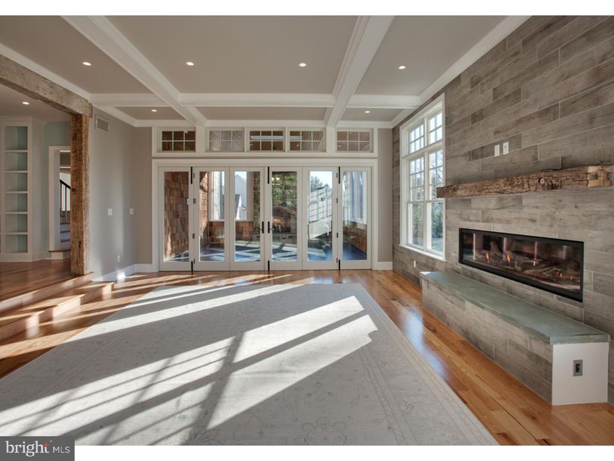 Classic Shingle Style home includes porches, high gambrel style gables and rustic informality.  Open floor plans, ten foot first floor and nine foot second floor ceilings, vaulted bedroom ceilings, wide hallways demonstrate a dimensional sensitivity that serves to infuse the home with a sense of airiness and natural daylight.  The outdoor, screened room opens to an expansive family room via a 16" folding glass door, blurring the line between indoors and out.  When open, the doors fold virtually out of sight allowing fresh air into this unparalleled and dramatic space that is nearly 45' x 20' in dimension.  When closed, they are a stately wall of light.  The Pub is incorporated into the first floor plan and is complete with space for wine and beverage refrigeration, ice maker, built-in bench and large pre-wired TV wall- making this the ultimate party hang-out space.  The Pub opens to the living room making this room functional again.  The built in banquette located in the kitchen promises to be the hub of family activity.  It has been designed to accommodate a multitude of functions such as informal dining, homework, art projects, home office, etc?.Stairs direct from garage to basement for easy loading and unloading; walk-in pantry with breakfast bar, all bedrooms with walk in closets, master dressing room, seasonal clothes storage in attic and multiple linen closets provide unparalleled storage space.  Access to flexible space above garage is served by a private access from the family entry.  Use a 5th bedroom, guest quarters, office or studio.  Re-purpose this space as needs change over time.