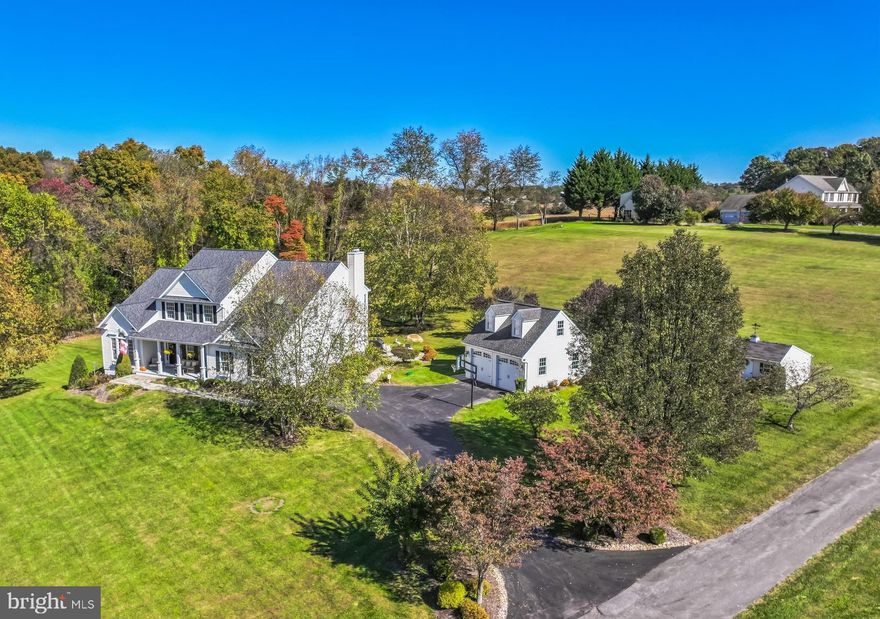 The home boasts classic colonial architecture with elegant curb appeal. Its spacious layout includes six generously sized bedrooms (5 BEDROOMS ON UPPER LEVEL), perfect for family living or hosting guests. The expansive floor plan includes formal living and dining rooms, an inviting family room with a wood-burning fireplace, a 1st-floor study/office, and a gourmet kitchen featuring high-end appliances, granite countertops, and ample cabinetry. 
 The home sits on a beautifully landscaped lot with mature trees and open views of the preserved farmland. This house, a Douglas Homes custom-built Sterling, is designed for outdoor living - a new TREX deck, a flagstone patio off the deck,  a flagstone patio at the rear walkout. A covered front porch, and a covered side porch,  providing the perfect settings for outdoor entertaining or enjoying serene sunsets over the rolling farmland.
 The home features two new HVAC systems, a recent 30-year architectural roof, hardwood floors on the main and bedroom levels (ash, hickory, and oak), four garage spaces (two-car attached and two-car detached garage with attic pull-down to huge storage above), and a fully finished lower level with a steam bath and a walkout to a custom bluestone patio. The home is wired and generator-ready. The internet service is high-speed Verizon fiber optic FIOS . There are no restrictions, covenants, or HOA; animals and livestock are welcome. 
 Carrs Mill Road offers picturesque surroundings and convenient access to local amenities, including blue ribbon schools, Western Regional Park, the Gary Arthur Community Center & the Glenwood Branch of Howard County Public Library are just up the street.
 Sited on nearly 4 acres in the heart of Western Howard County's historic rolling hills, this stunning six-bedroom, three-and-a-half-bathroom colonial home offers almost 5,600 square feet of finished living space. Carrs Mill Road is a designated scenic road that assures it's not to be widened or altered, and the property is surrounded by over 1,300 acres of farmland preserved under the county's preservation program, ensuring the neighborhood's natural beauty remains untouched for generations to come. See property documents for a map.
 This home is ideal for those seeking a blend of luxury living and rural tranquility in one of Howard County's most desirable locations. First time offered by the original owners of 25 years.