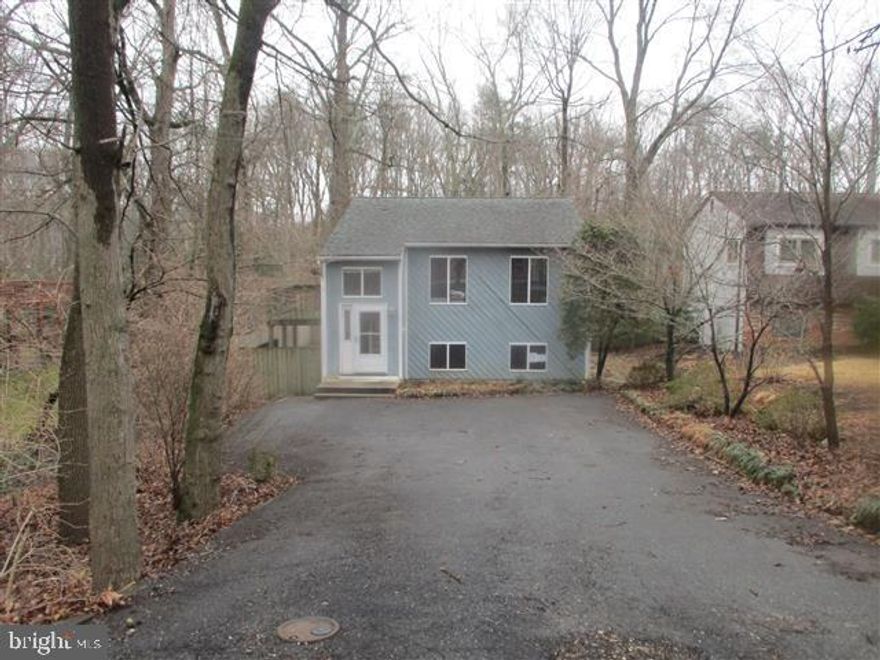 Spacious Split Level offered in Mckinsey Woods. Private lot with shed and trees. Open floor plan on main level with hardwood and lots of upgrades in the past. Kitchen has built-in's , granite counters & more. Main level has 2 bedrooms with generous closet space and full bath. Full Lower level offers 2 bedrooms , full bath and family room. Walk out level to rear yard. Agents view agent remarks and documents loads on this mls.